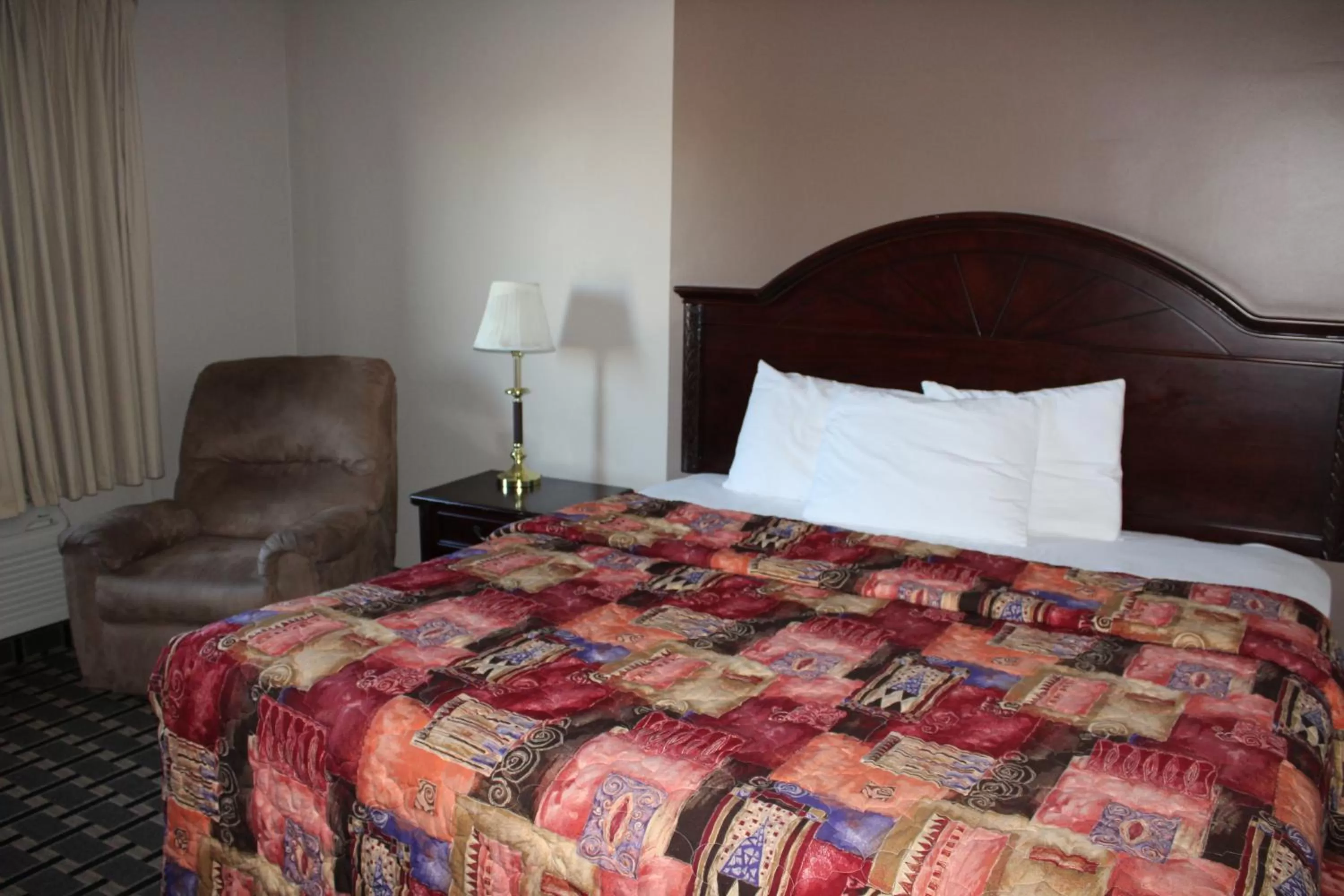 Bedroom, Bed in Coratel Inn and Suites Maple Grove