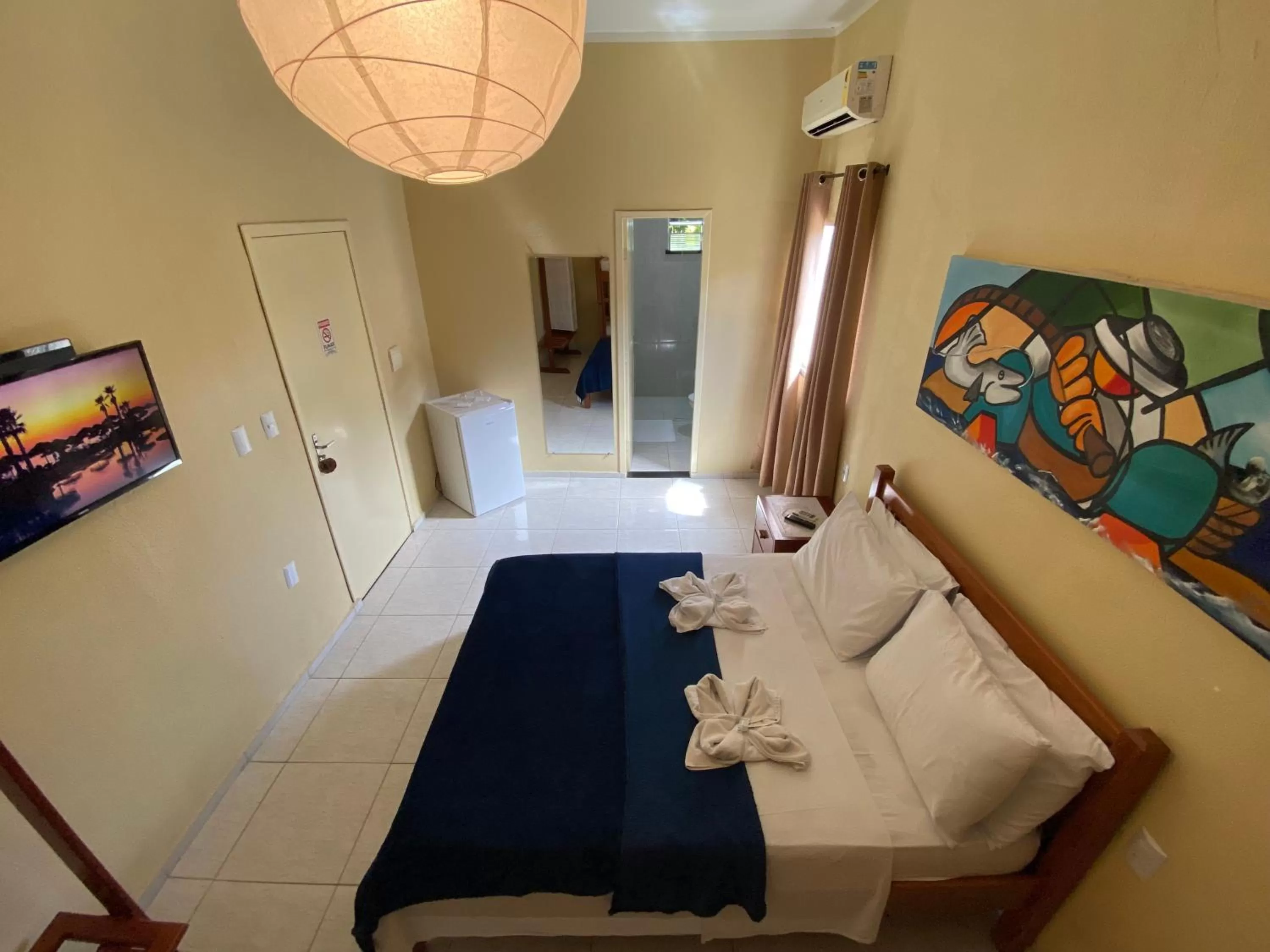 Bed in Refúgio Pousada Fortaleza