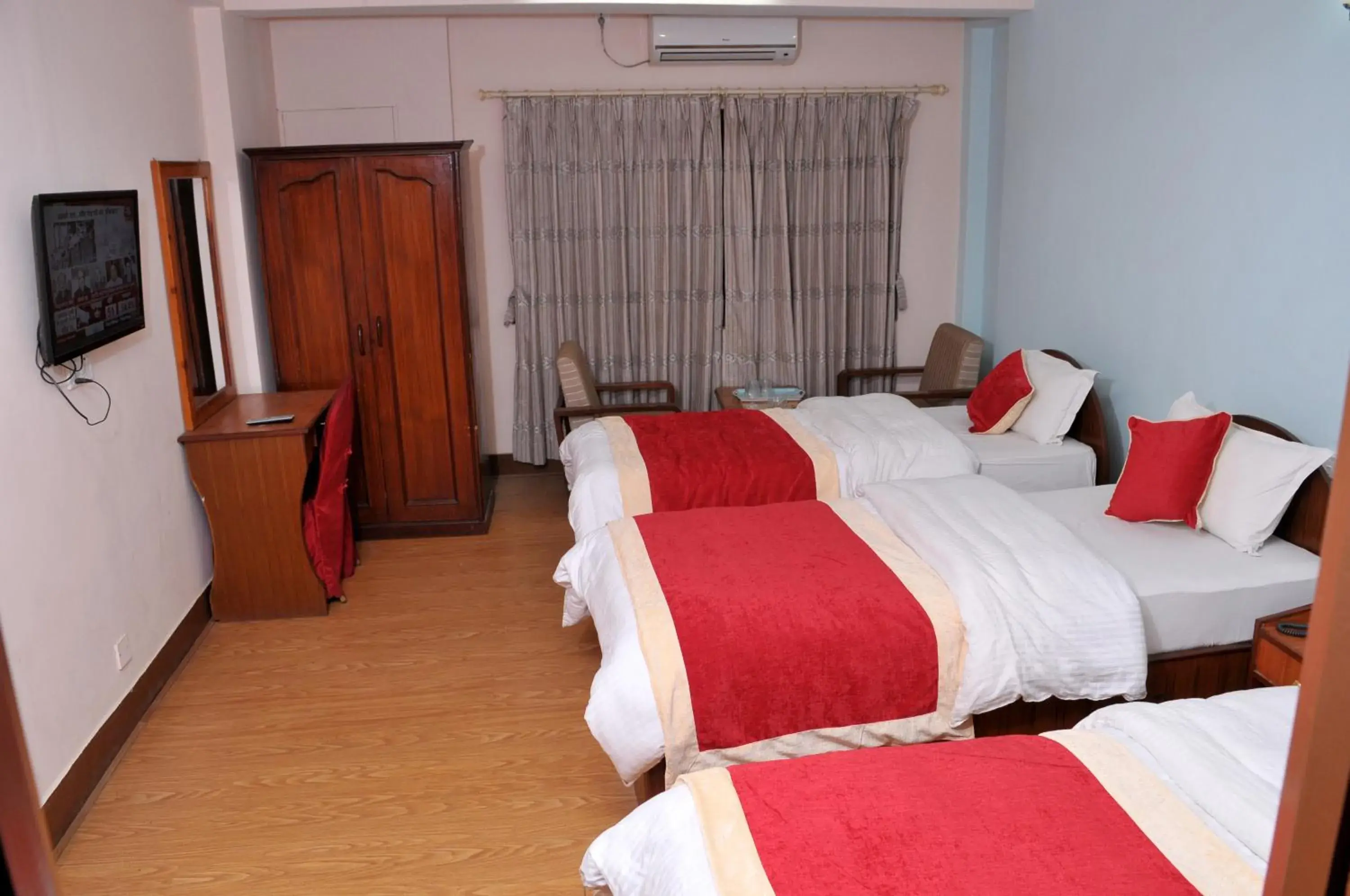 Photo of the whole room, Bed in Hotel Brihaspati