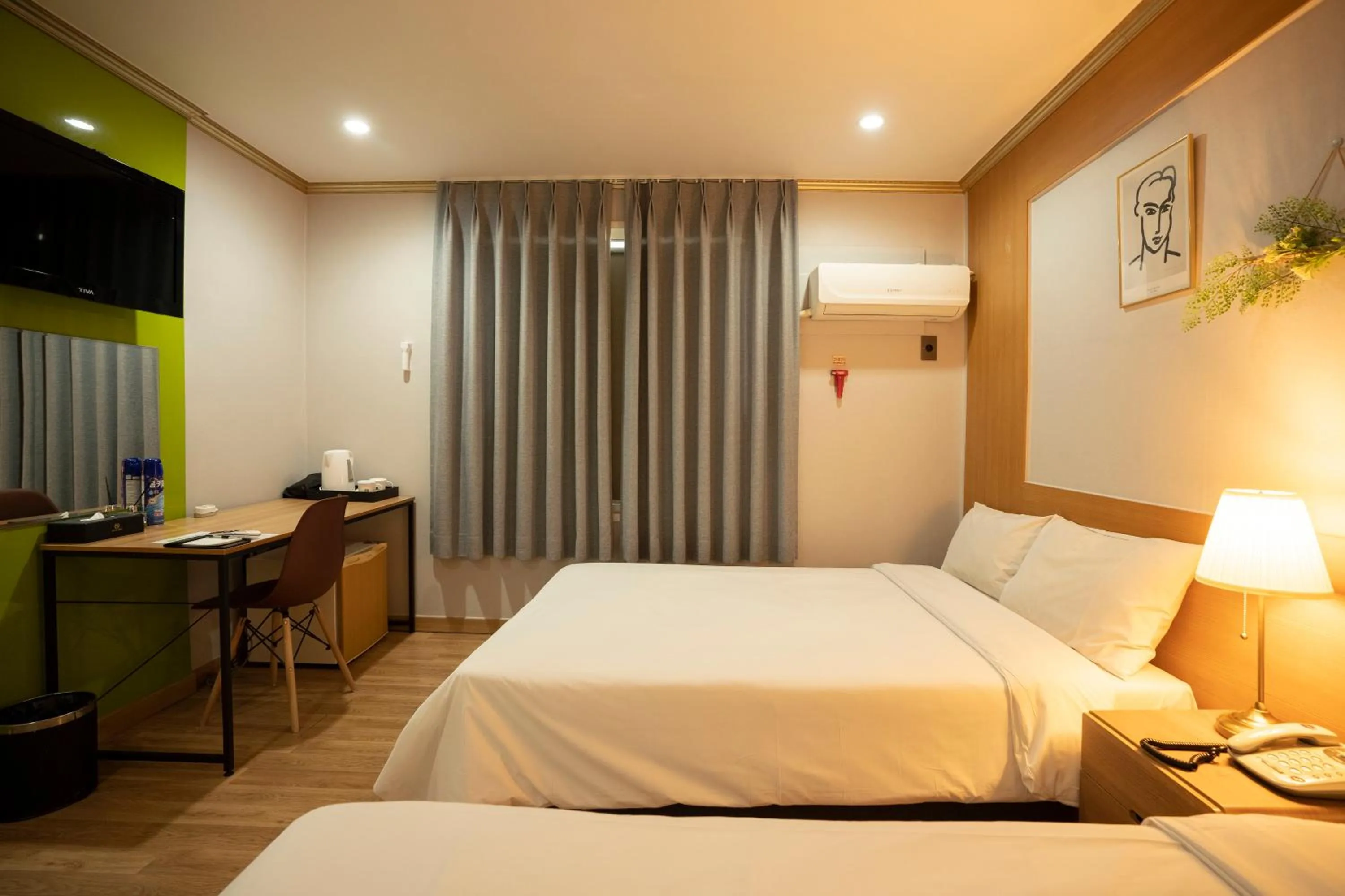 Bed in Jeju Stay Hotel