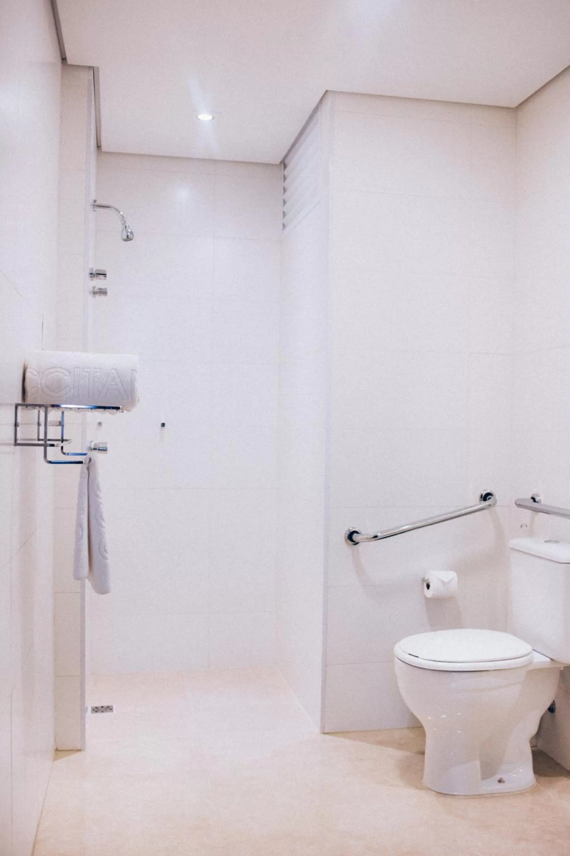 Toilet in Occitano Apart Hotel