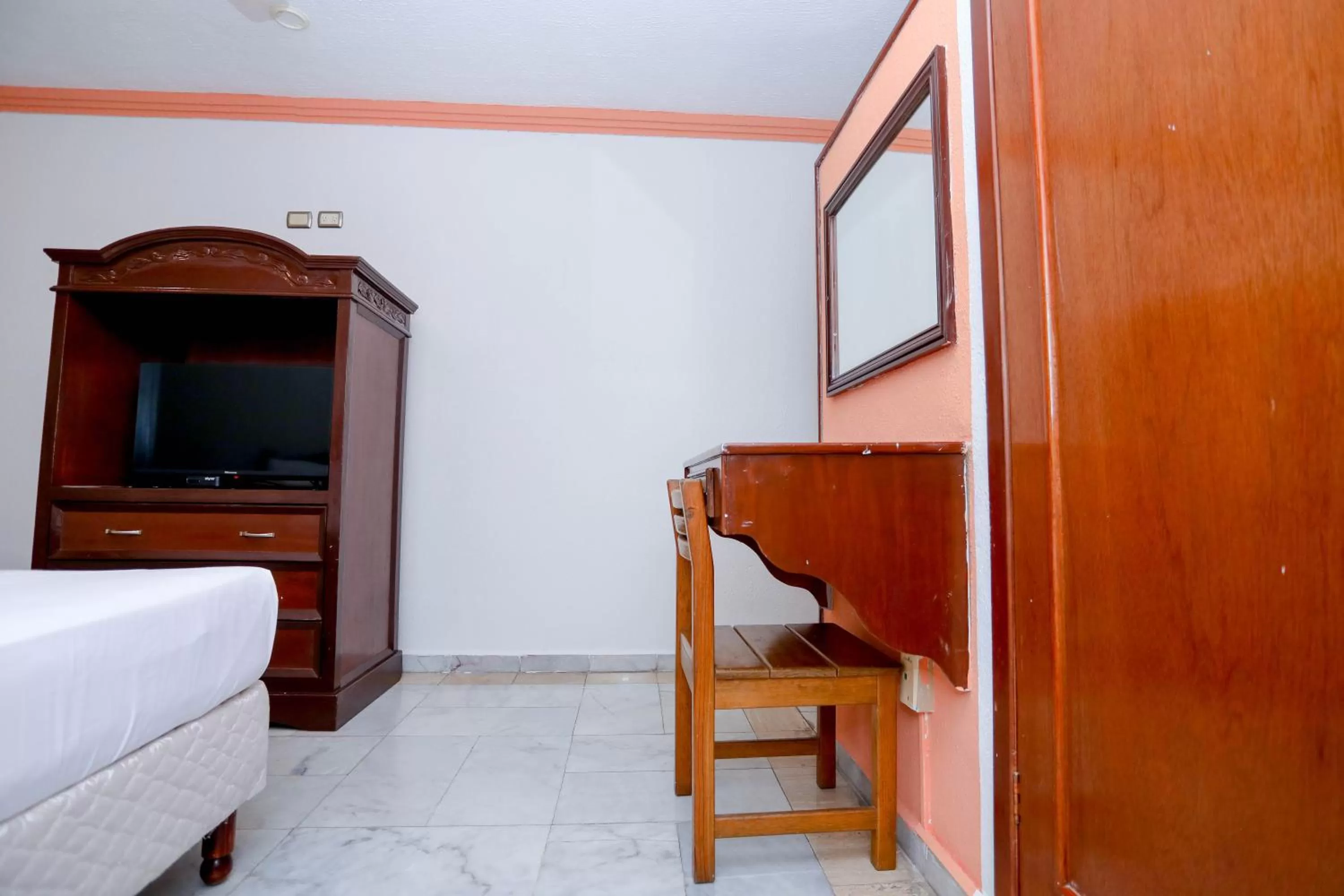 Bed in Hotel Avenida Cancun