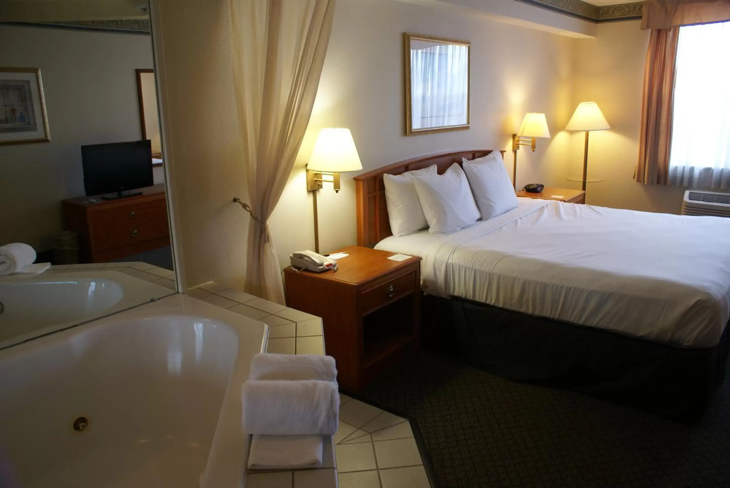 King Suite with Spa Bath in Country Inn & Suites by Radisson, Lansing, MI King Suite with Spa Bath in Country Inn & Suites by Radisson, Lansing, MI