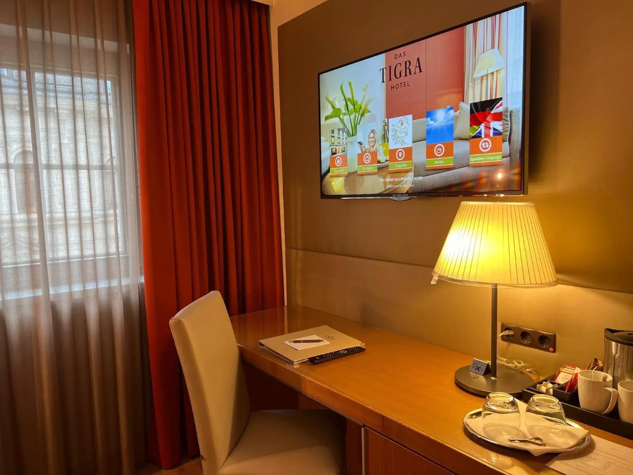 TV and multimedia, TV/Entertainment Center in Boutique Hotel Das Tigra