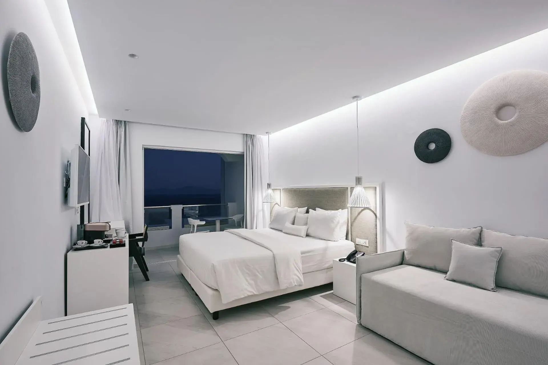 Photo of the whole room, Bed in Dimitra Beach Hotel & Suites Photo of the whole room, Bed in Dimitra Beach Hotel & Suites