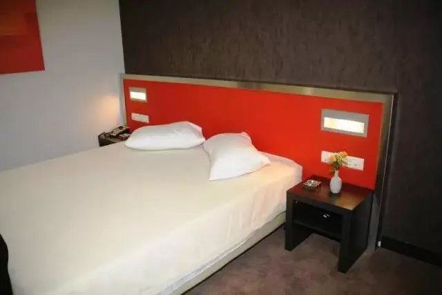 Bed in Hotel Des Roses