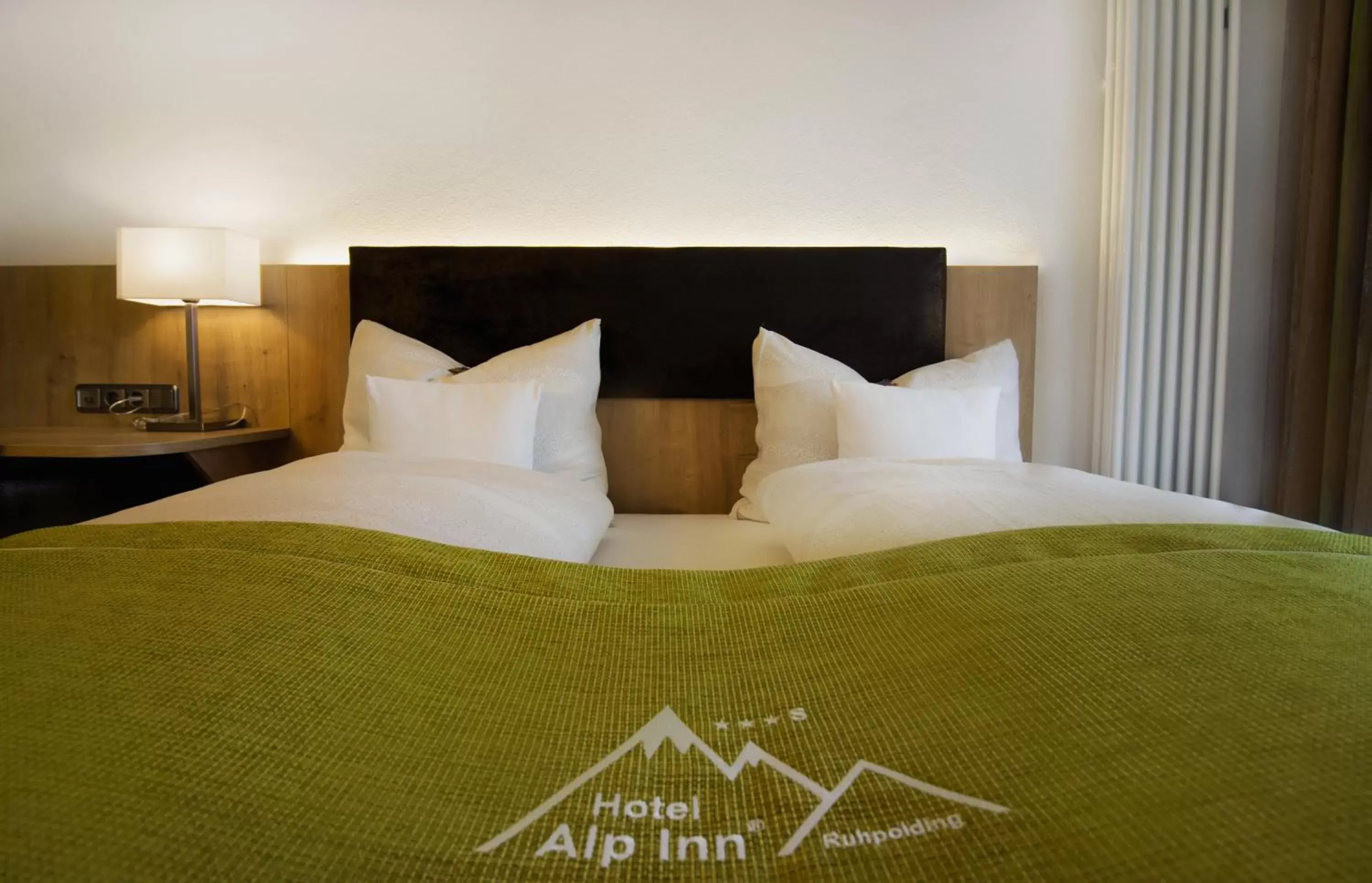 Bed in Hotel Alp Inn