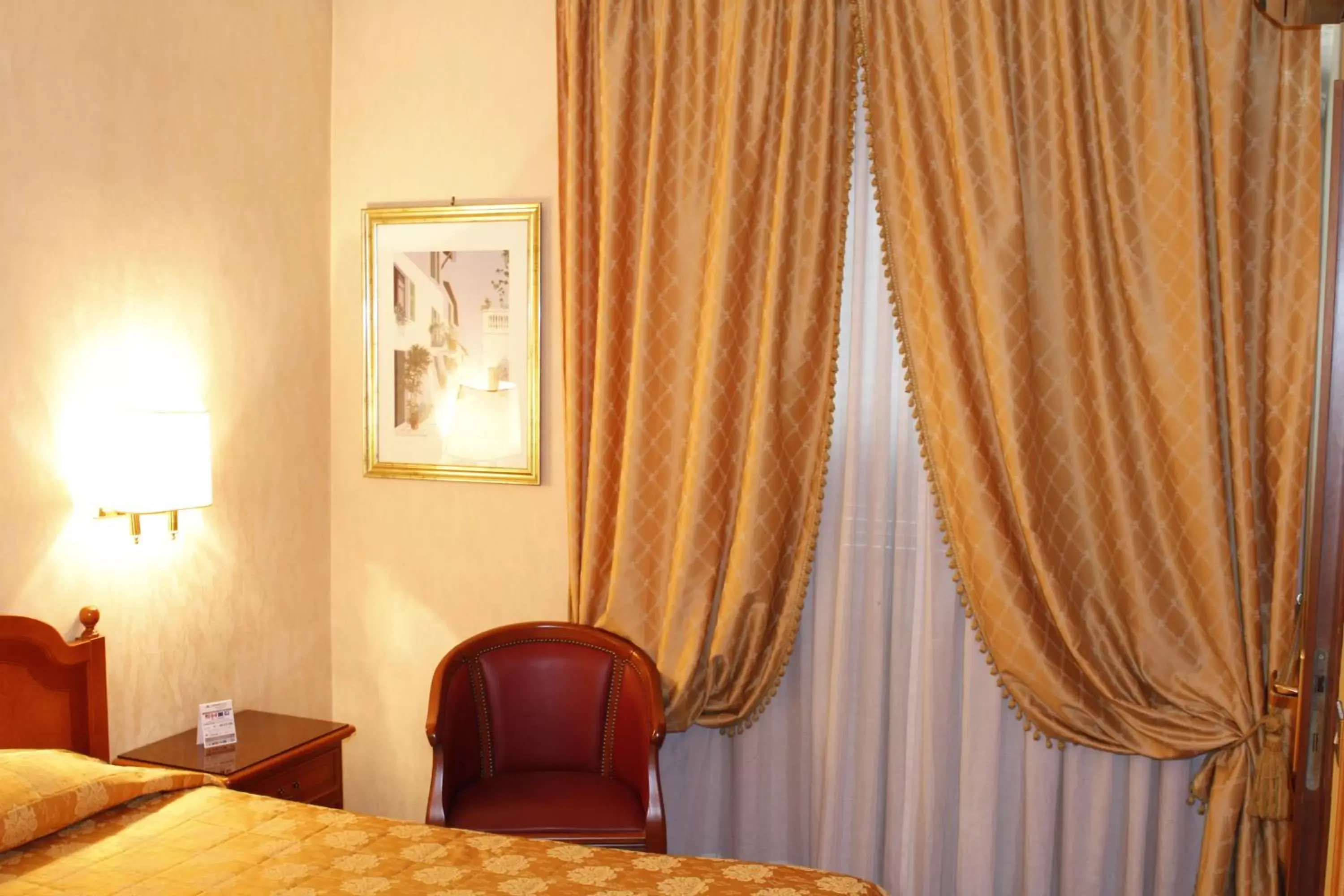 Bedroom, Seating Area in Hotel Pace Helvezia