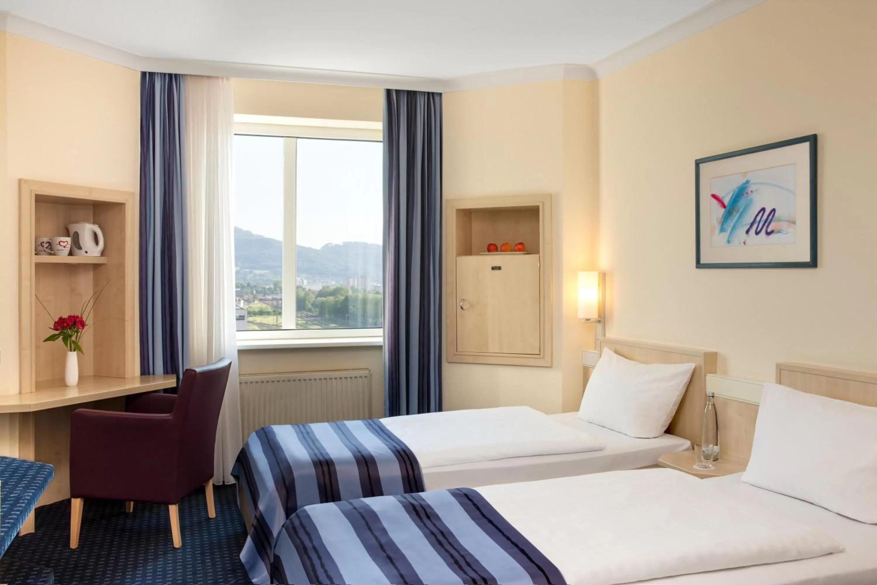 Photo of the whole room, Bed in IntercityHotel Freiburg