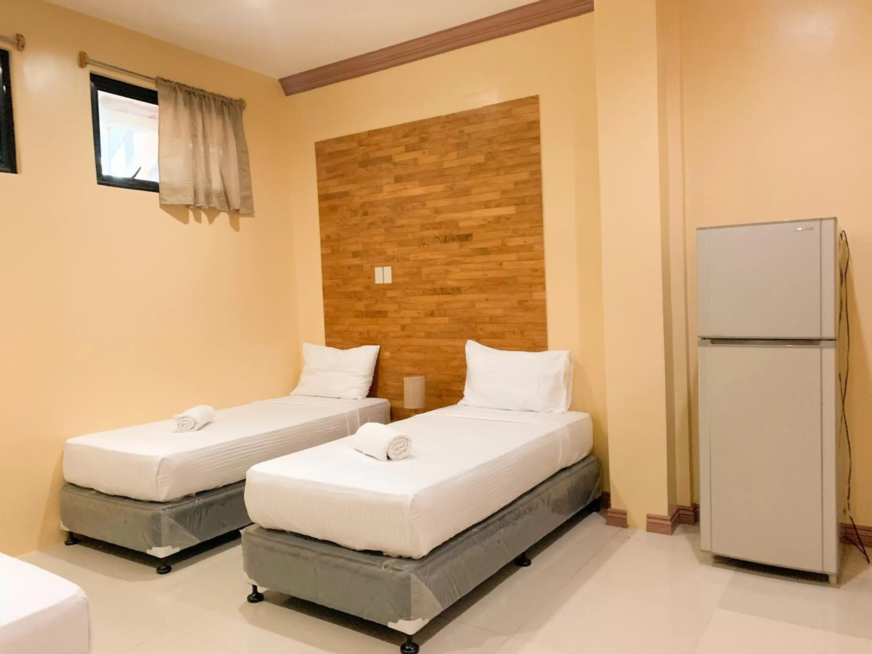 Bed in Mabini Hotel