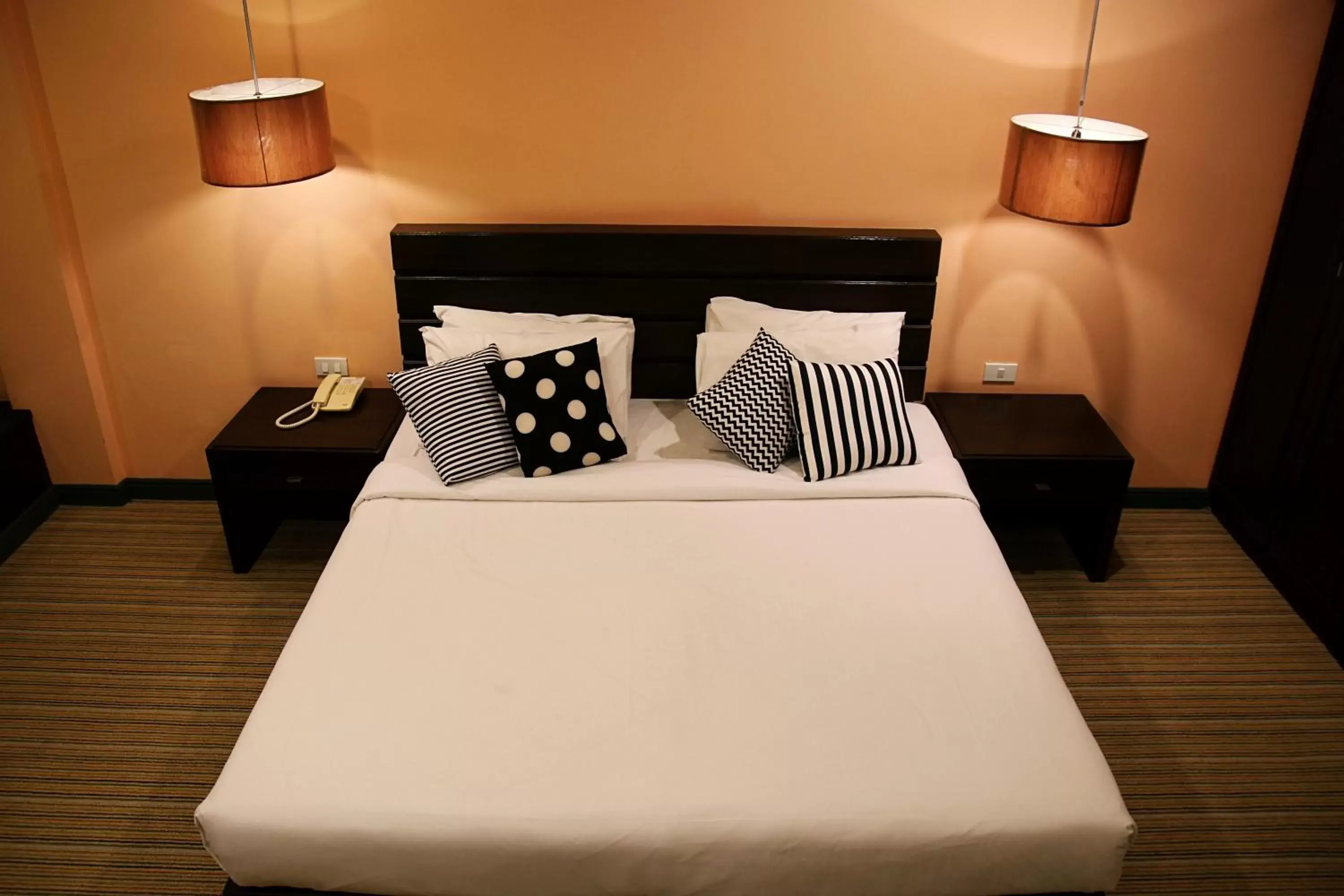 Bed in Aekpailin River Kwai Resort