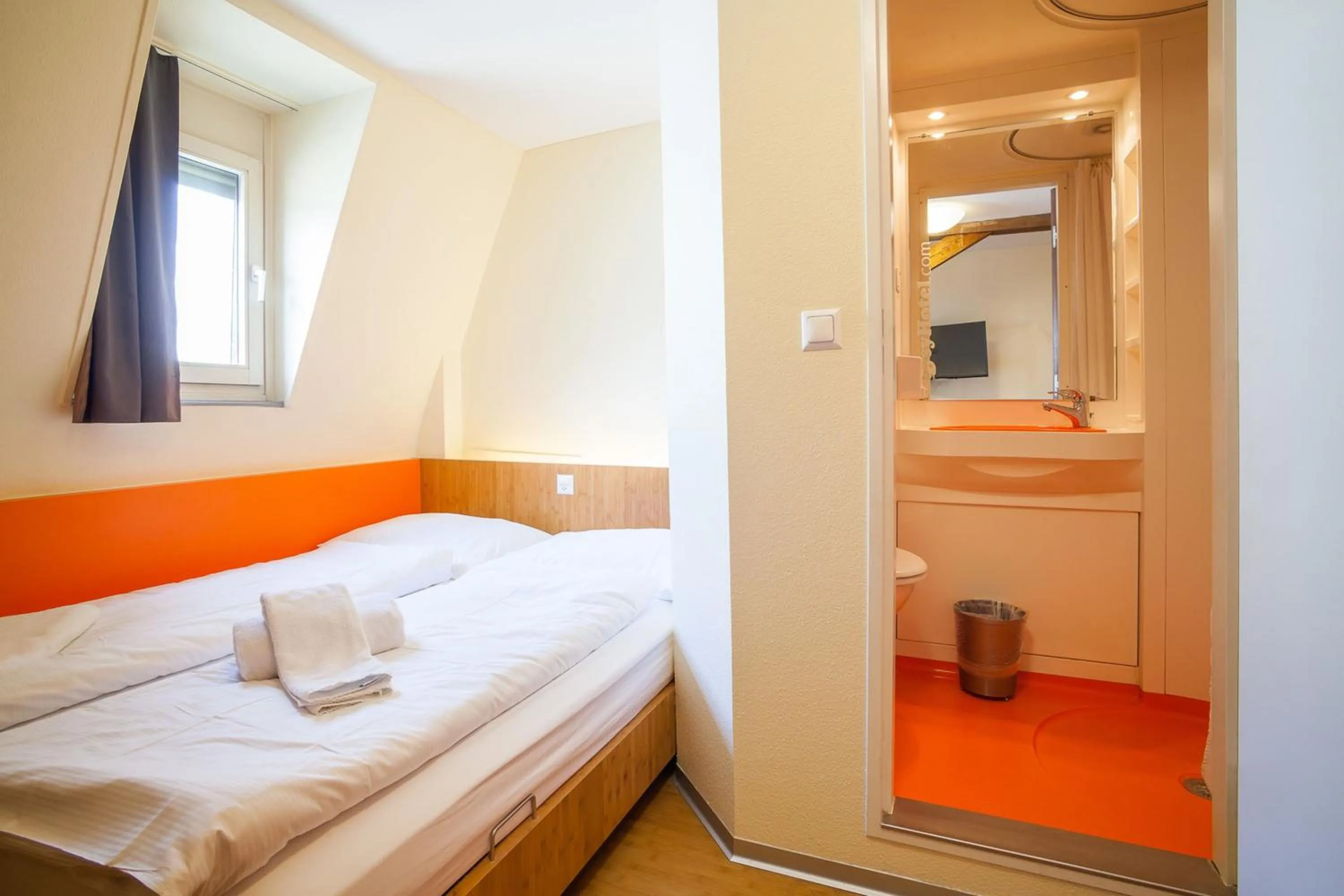 Bathroom, Bed in easyHotel Basel - self service and self check-in