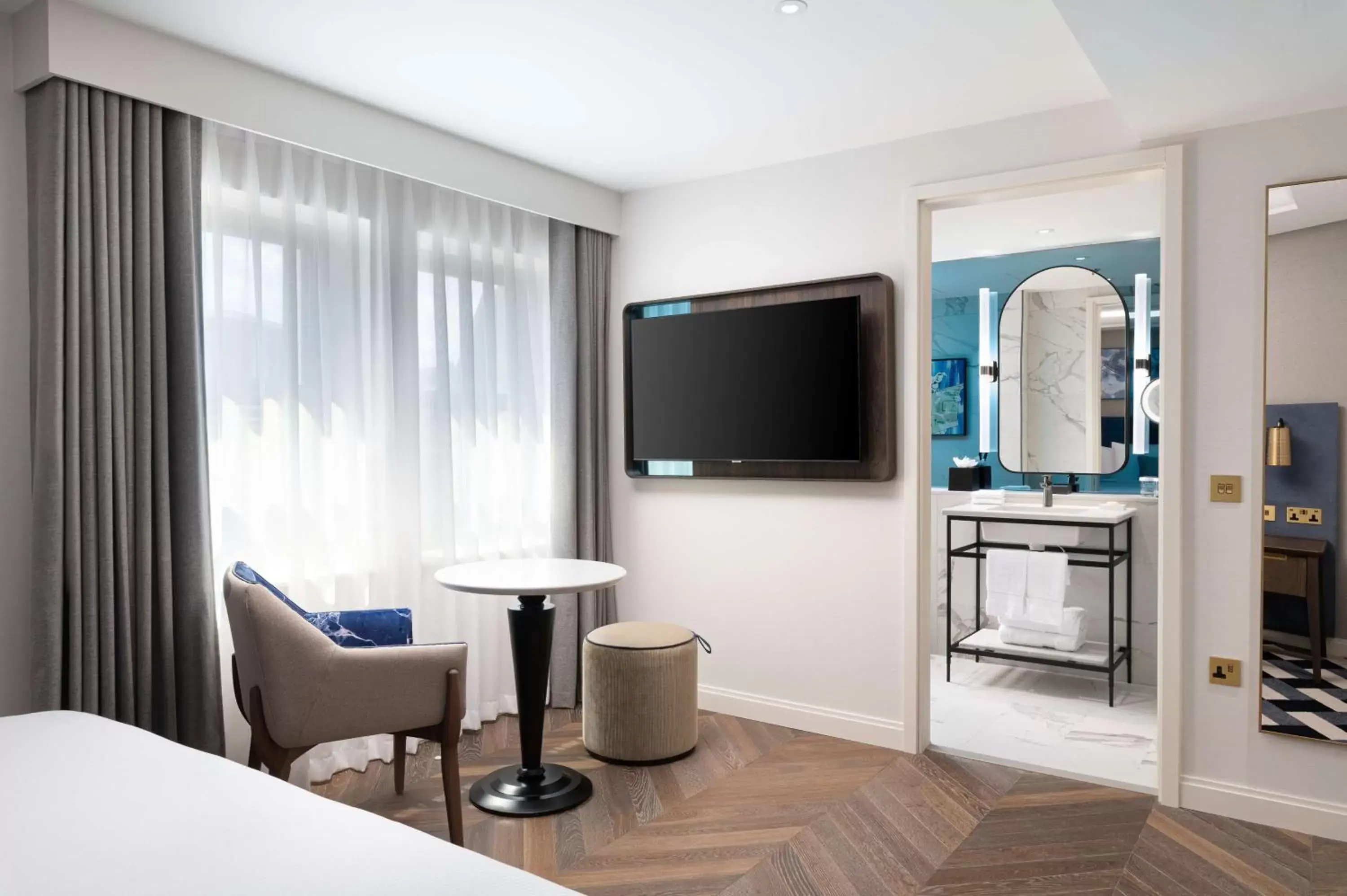 Bed, TV/Entertainment Center in Lost Property St Pauls London, Curio Collection By Hilton