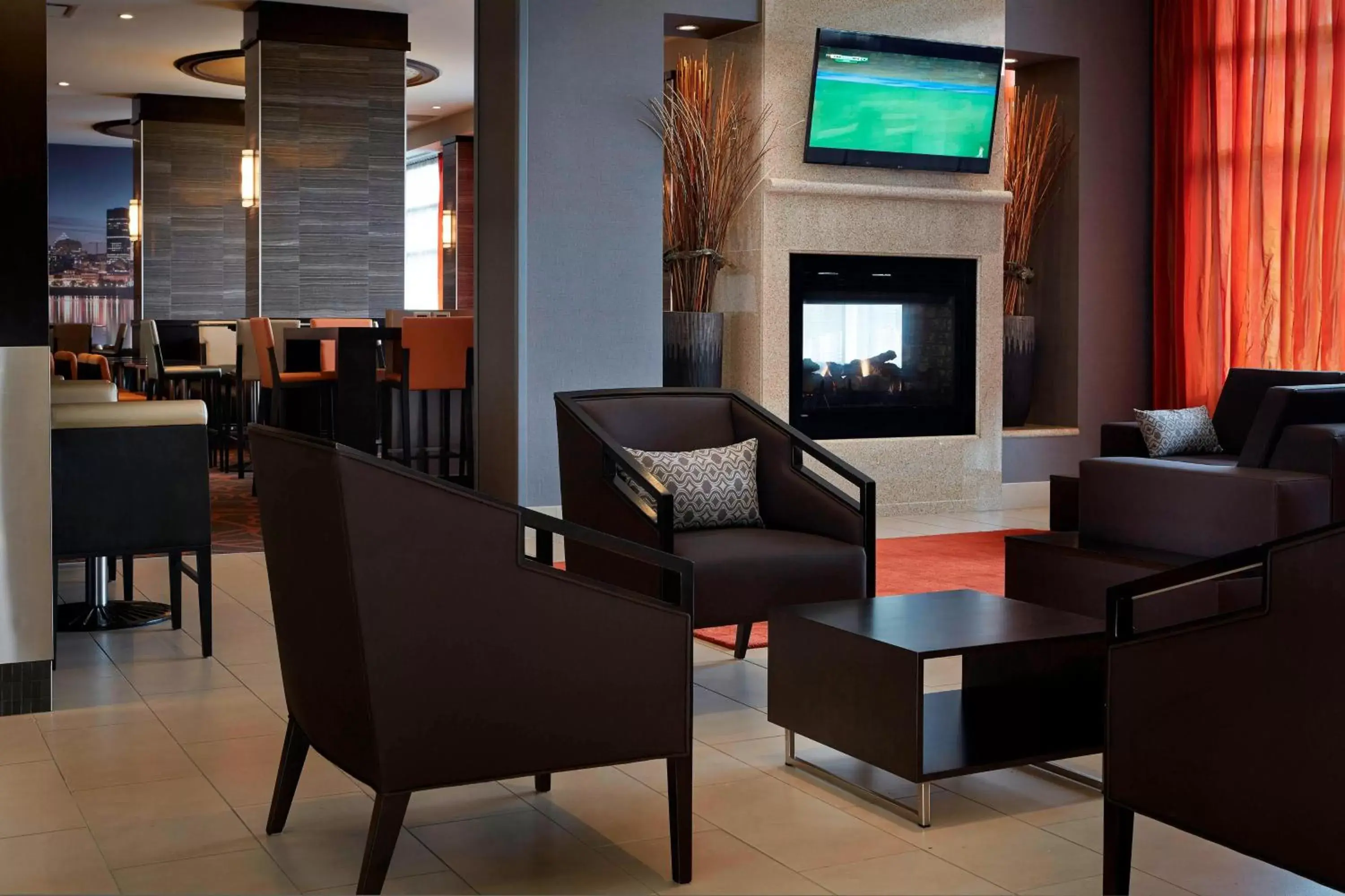 Lobby or reception, Lounge/Bar in Residence Inn by Marriott Montreal Airport