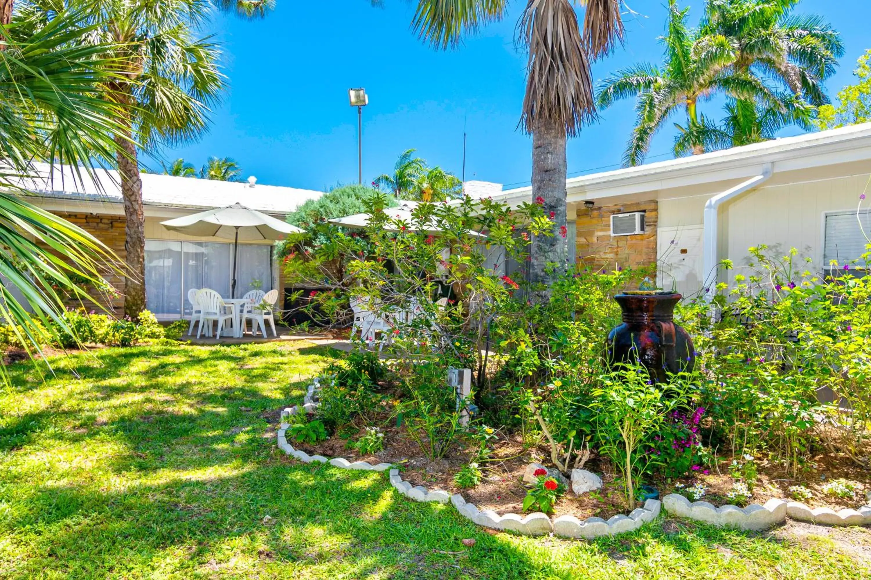 Garden view, Property Building in The Fairways Inn of Naples