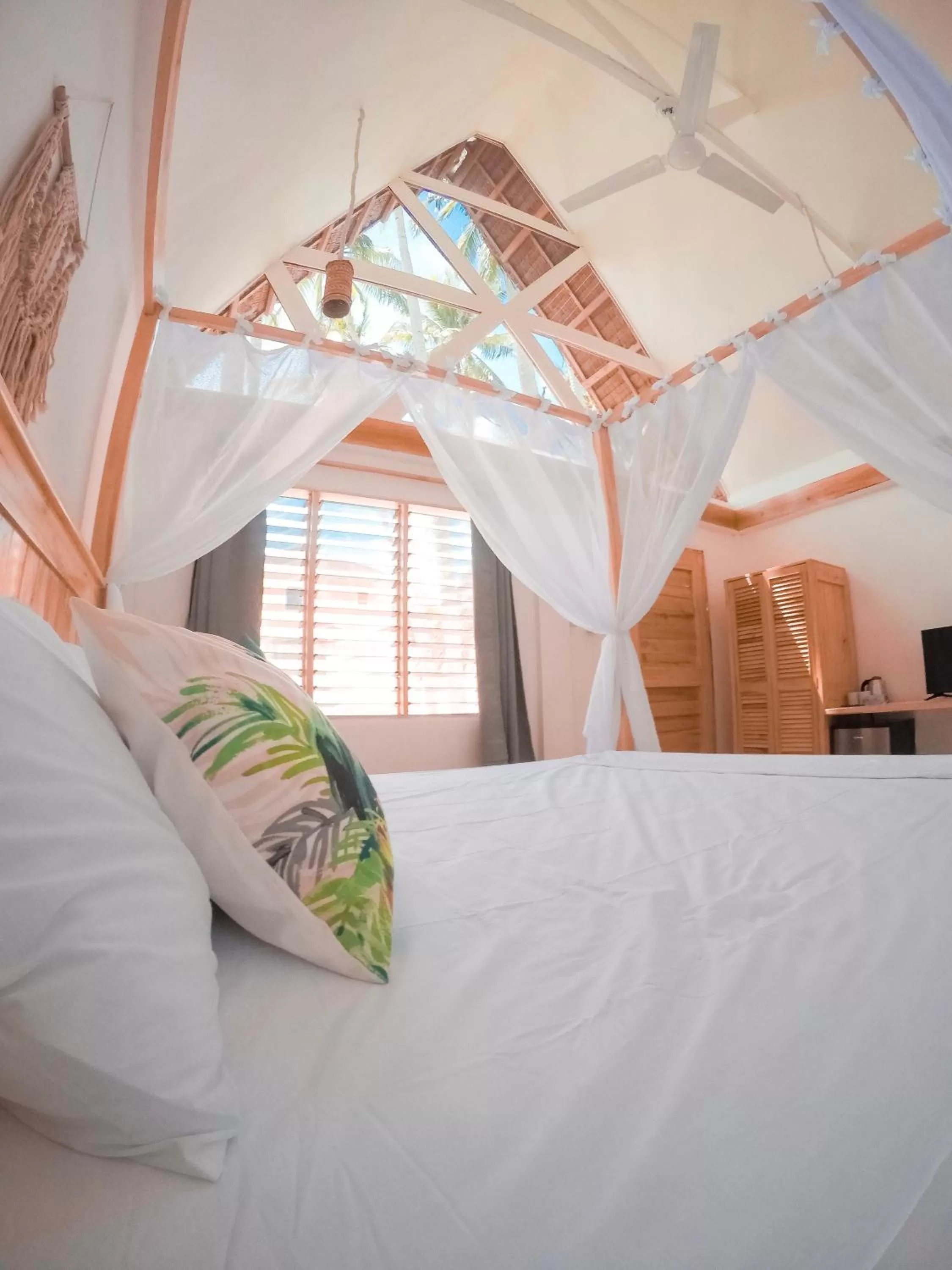 Bed in Bermuda Triangle Bungalows