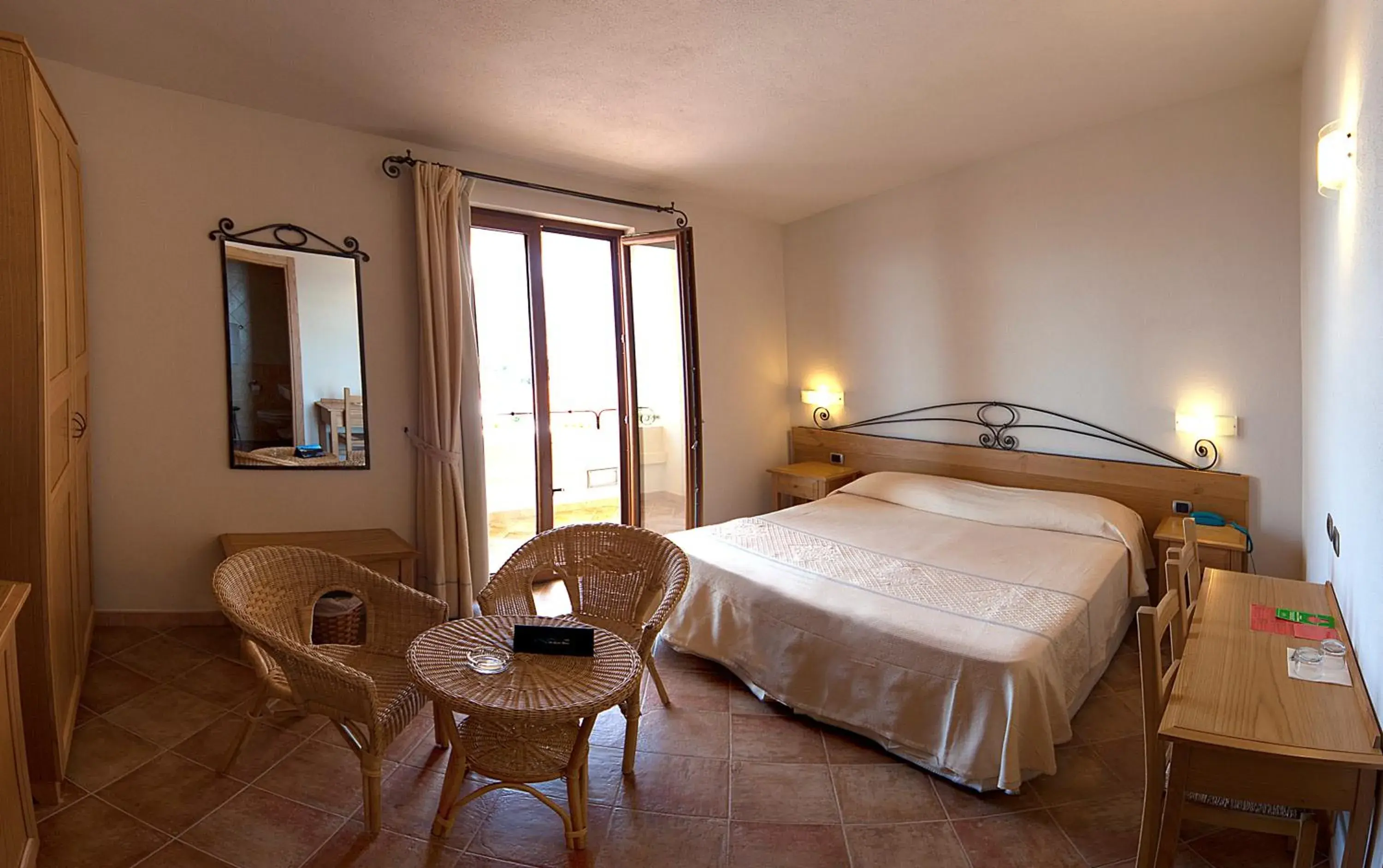 Photo of the whole room, Bed in Hotel Villa Gustui Maris