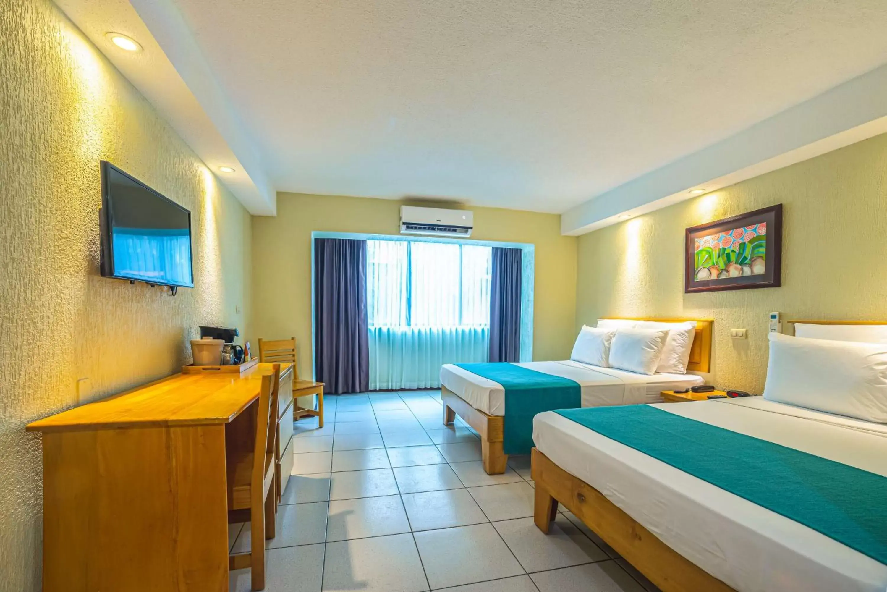 Bedroom in Best Western Jaco Beach All Inclusive Resort