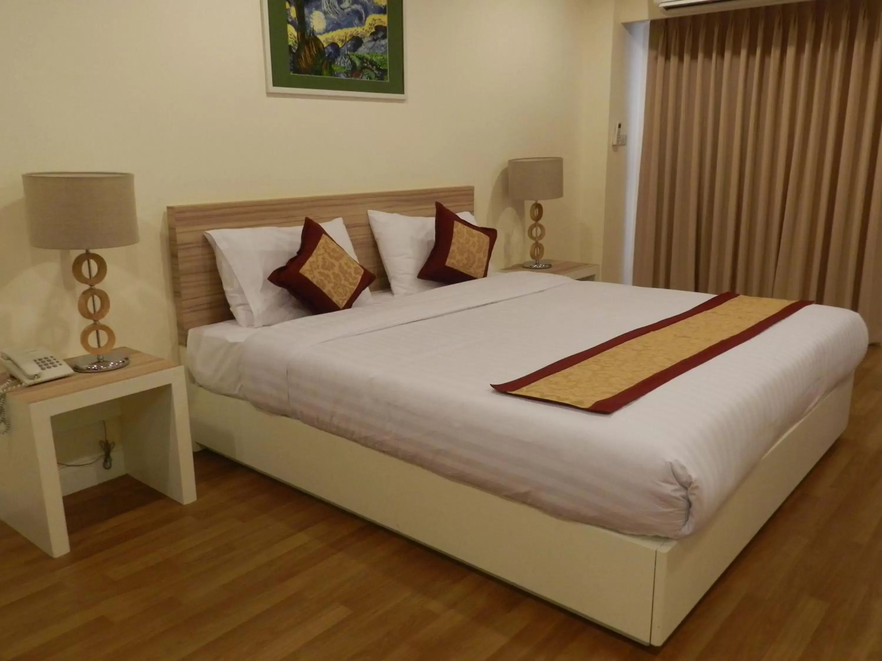 Bed in Nanatai Suites