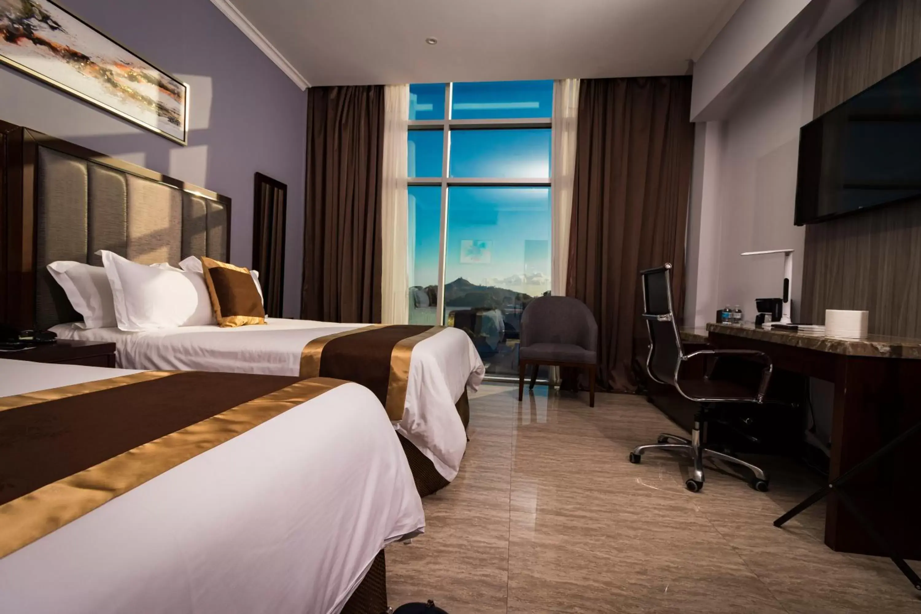 Twin Room with City View in Hotel City Plaza & Suites Twin Room with City View in Hotel City Plaza & Suites