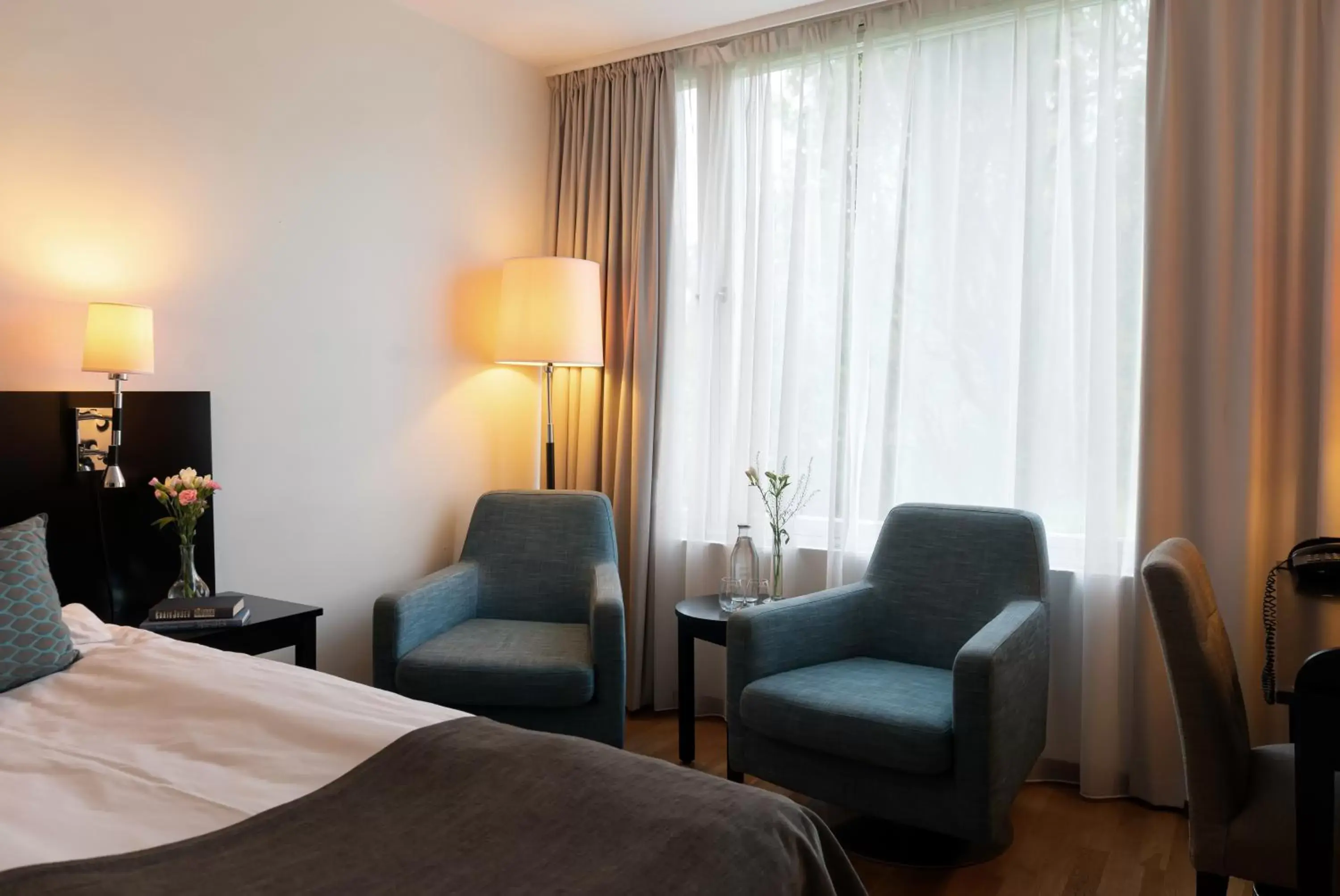 Seating area, Bed in Elite Stadshotellet Västerås Seating area, Bed in Elite Stadshotellet Västerås