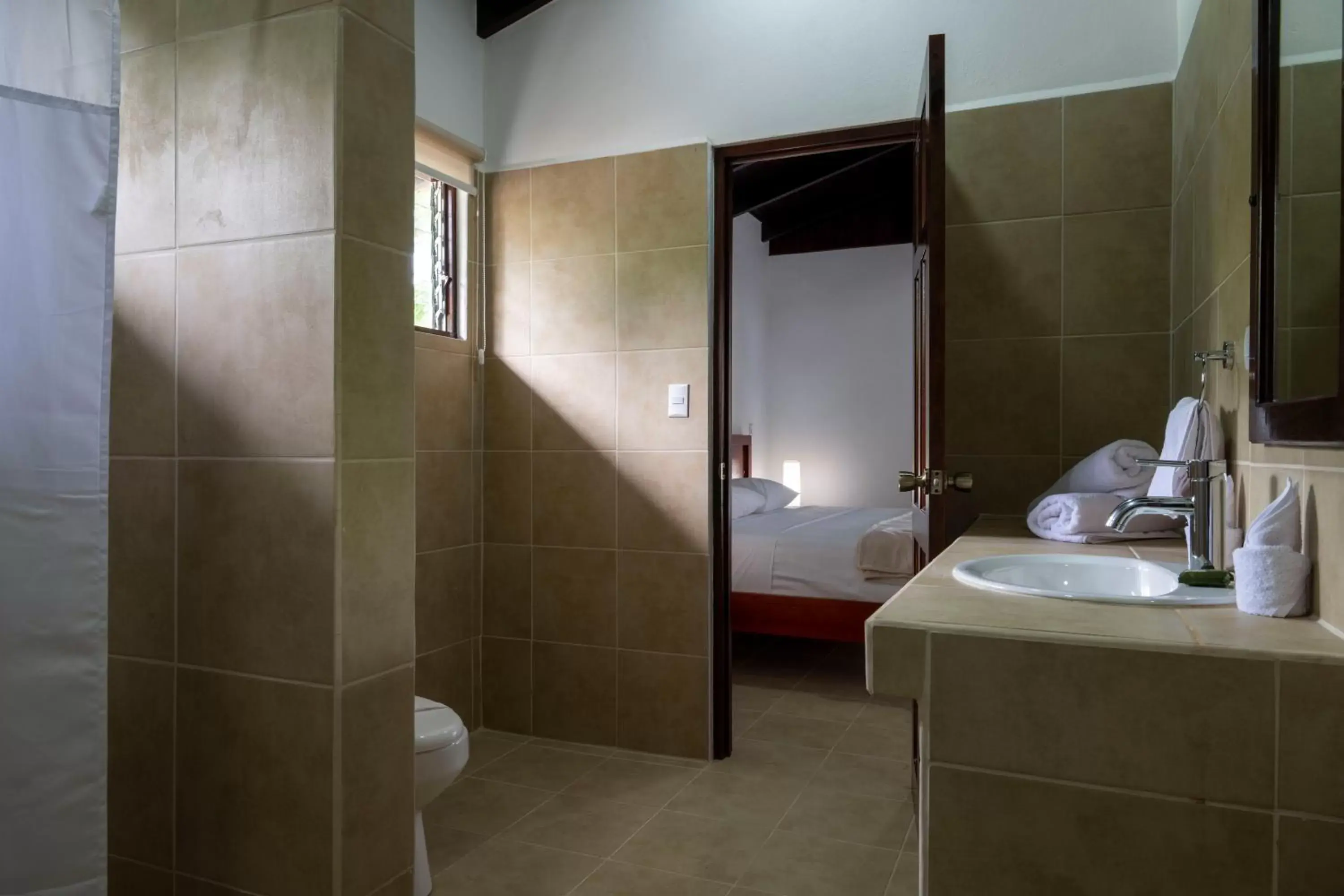 Bathroom in Fuego del Sol Beachfront Hotel