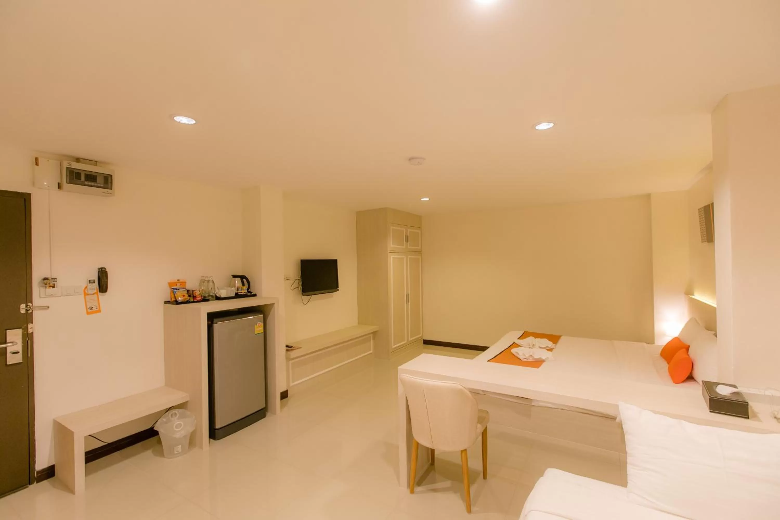 Bed in De Hug Hotel & Residence