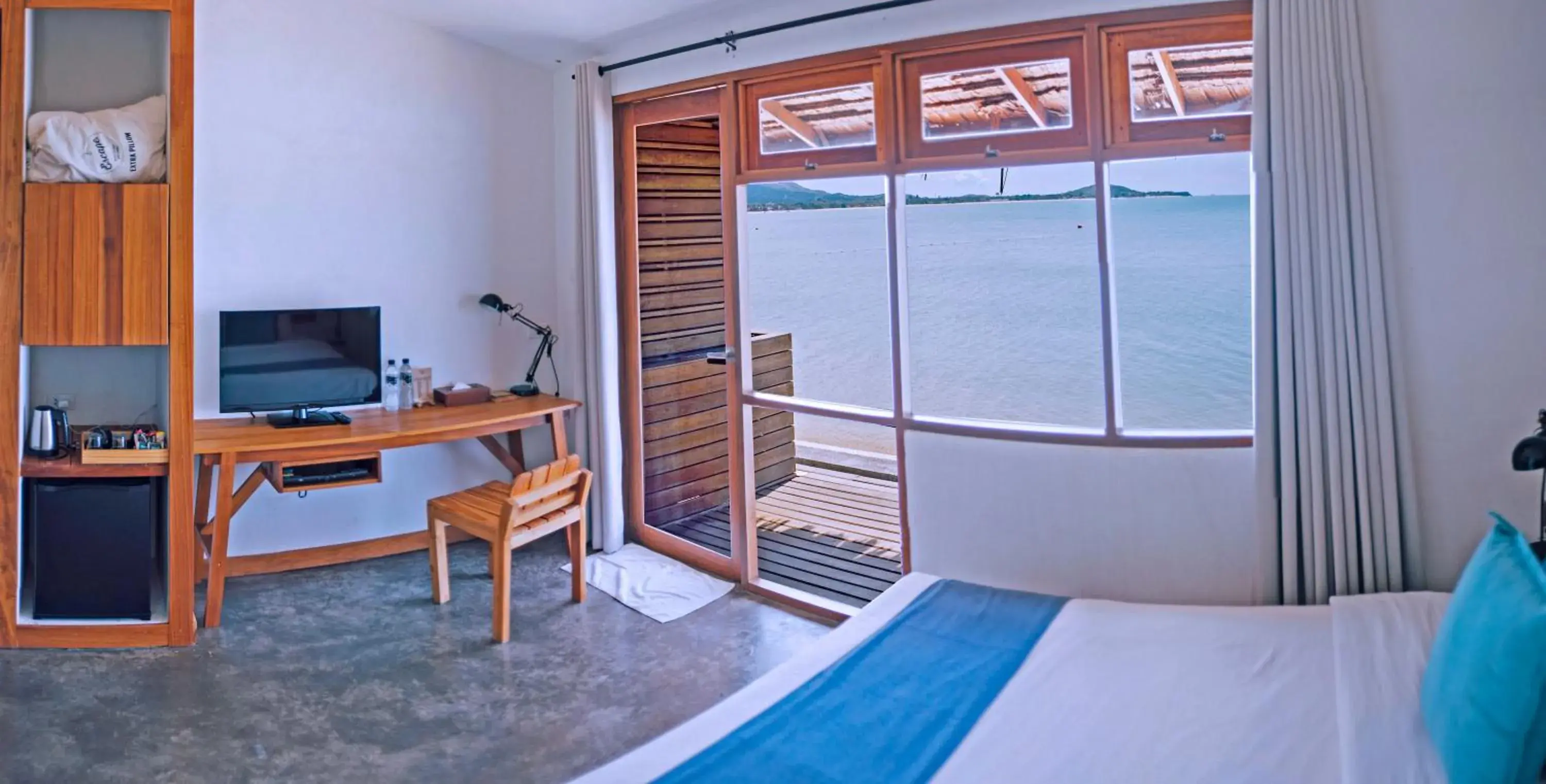 Bed, TV/Entertainment Center in Escape Beach Resort - SHA Extra Plus Certified