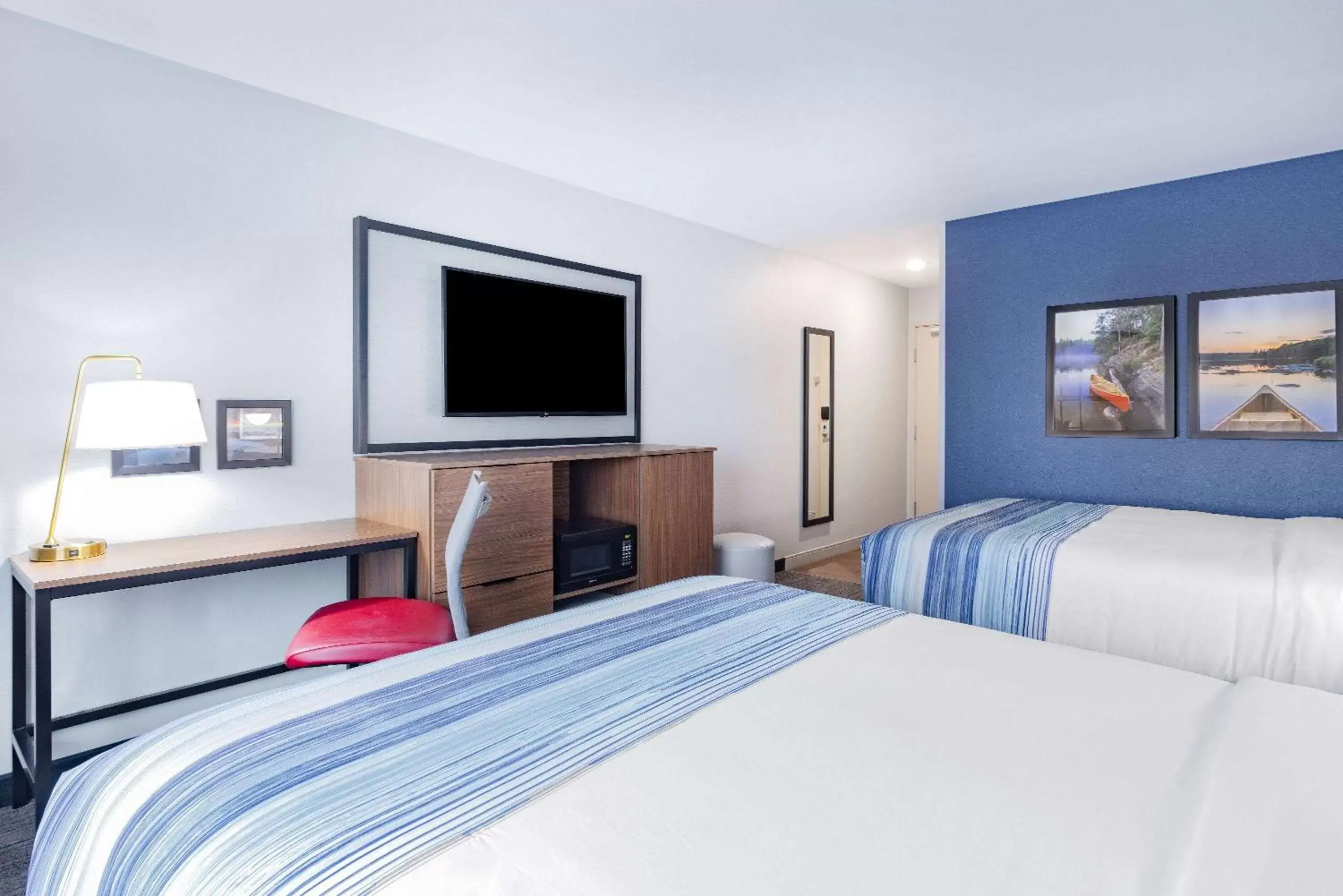 Photo of the whole room, Bed in AmericInn by Wyndham International Falls