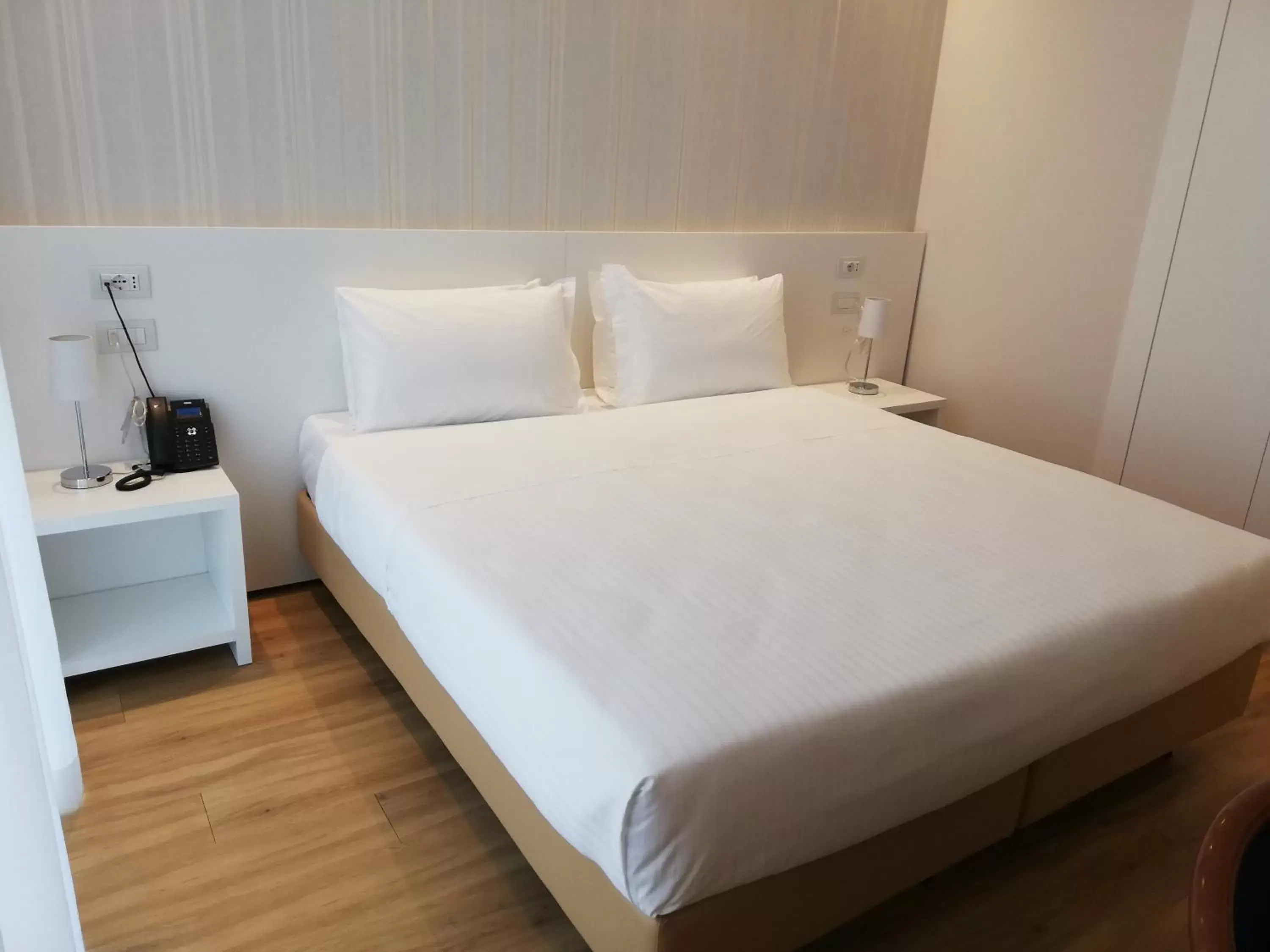 Bed in Novo Hotel Rossi