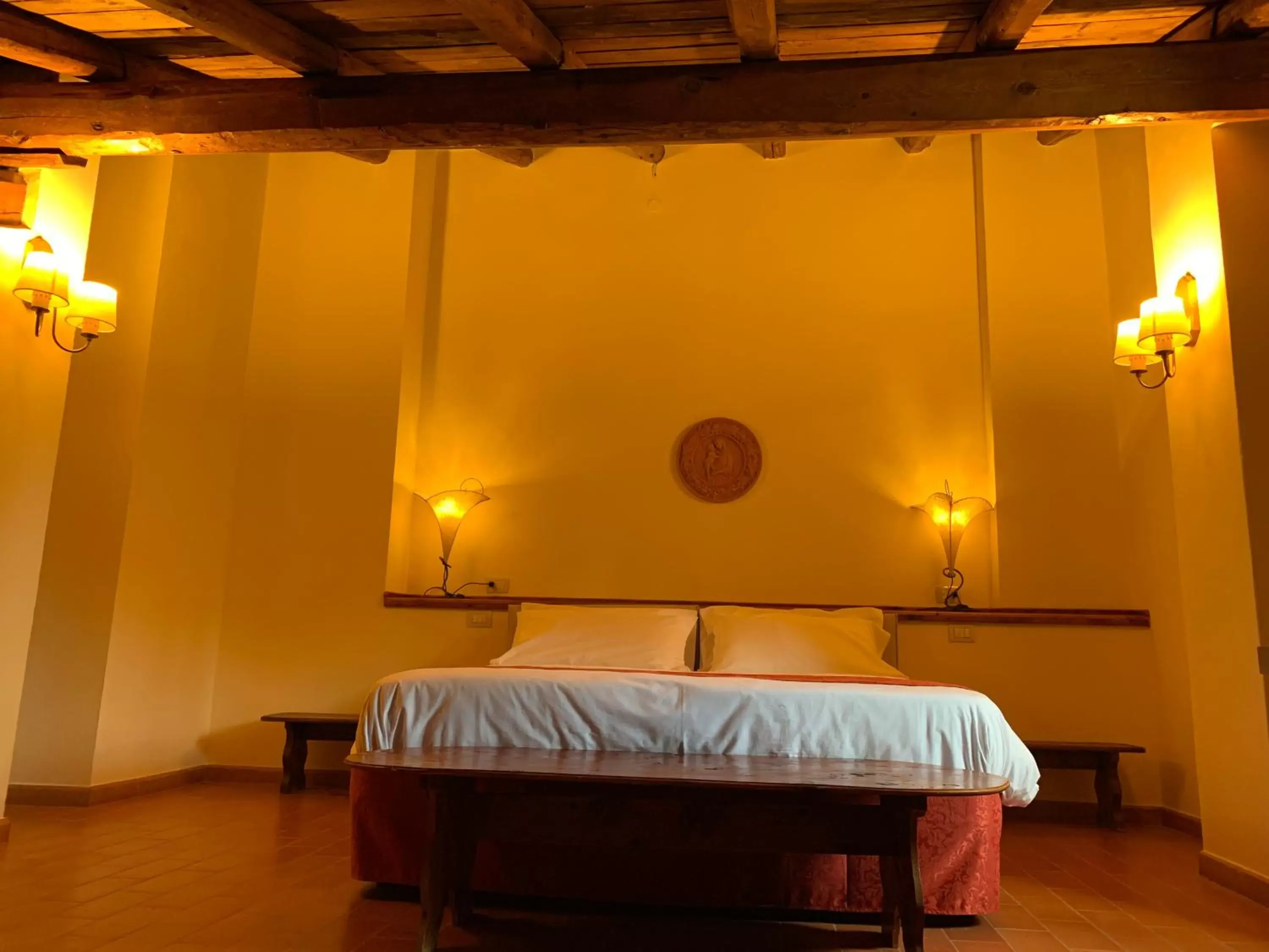 Bed in PALAZZO DE' ROSSI HOTEL