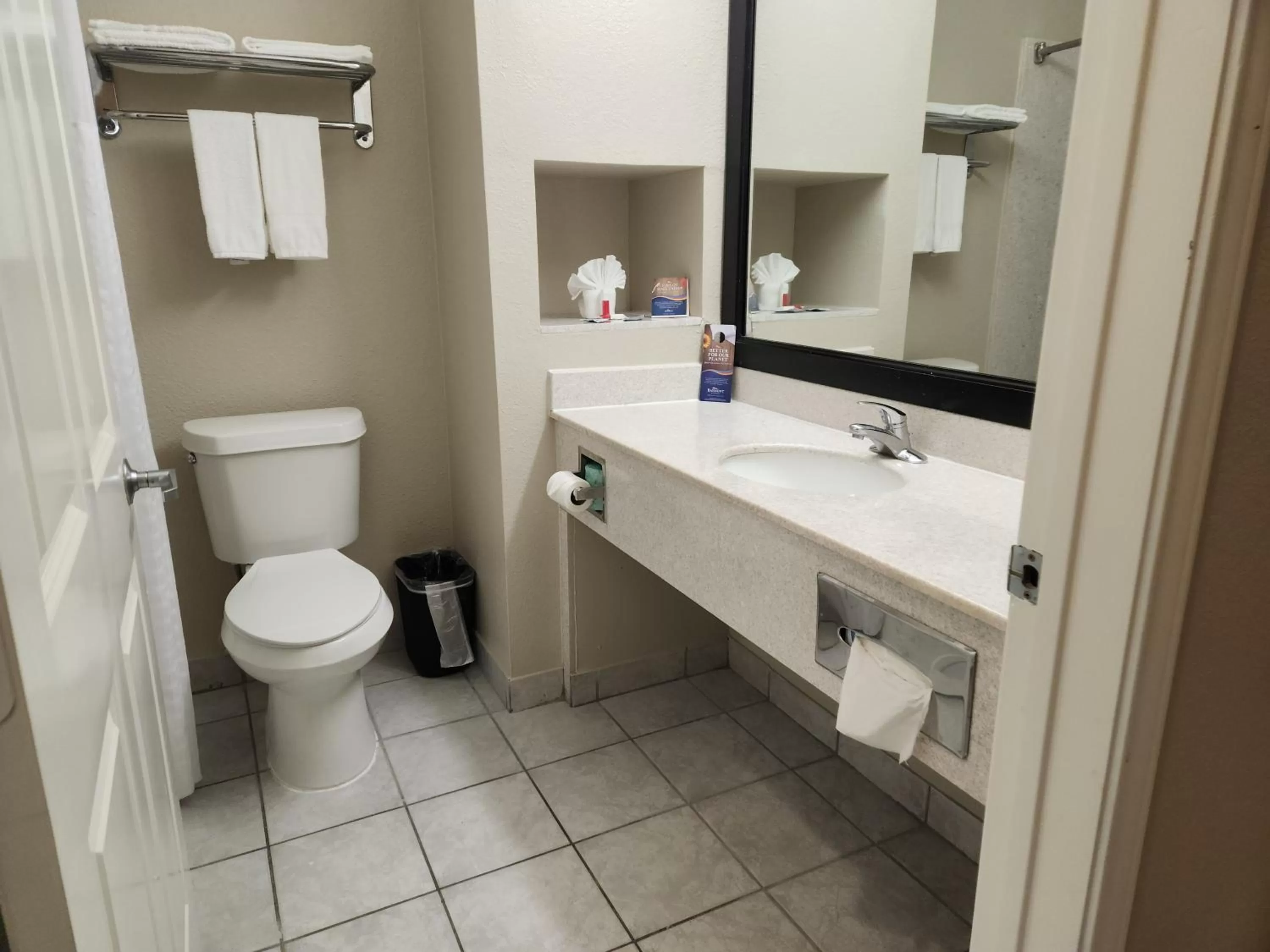 Bathroom in Baymont by Wyndham Houston Brookhollow