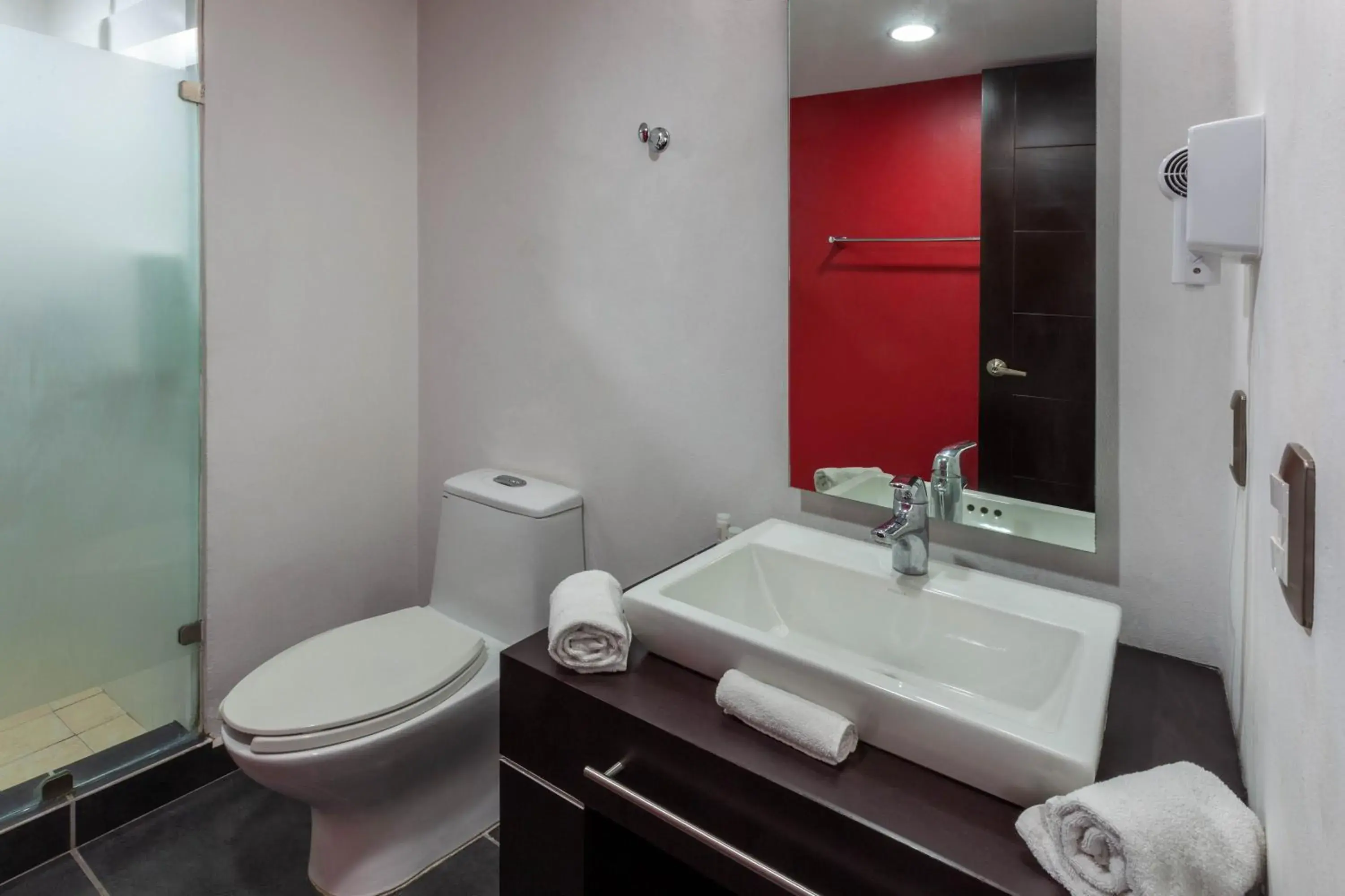 Bathroom in Ramada by Wyndham Acapulco Hotel & Suites