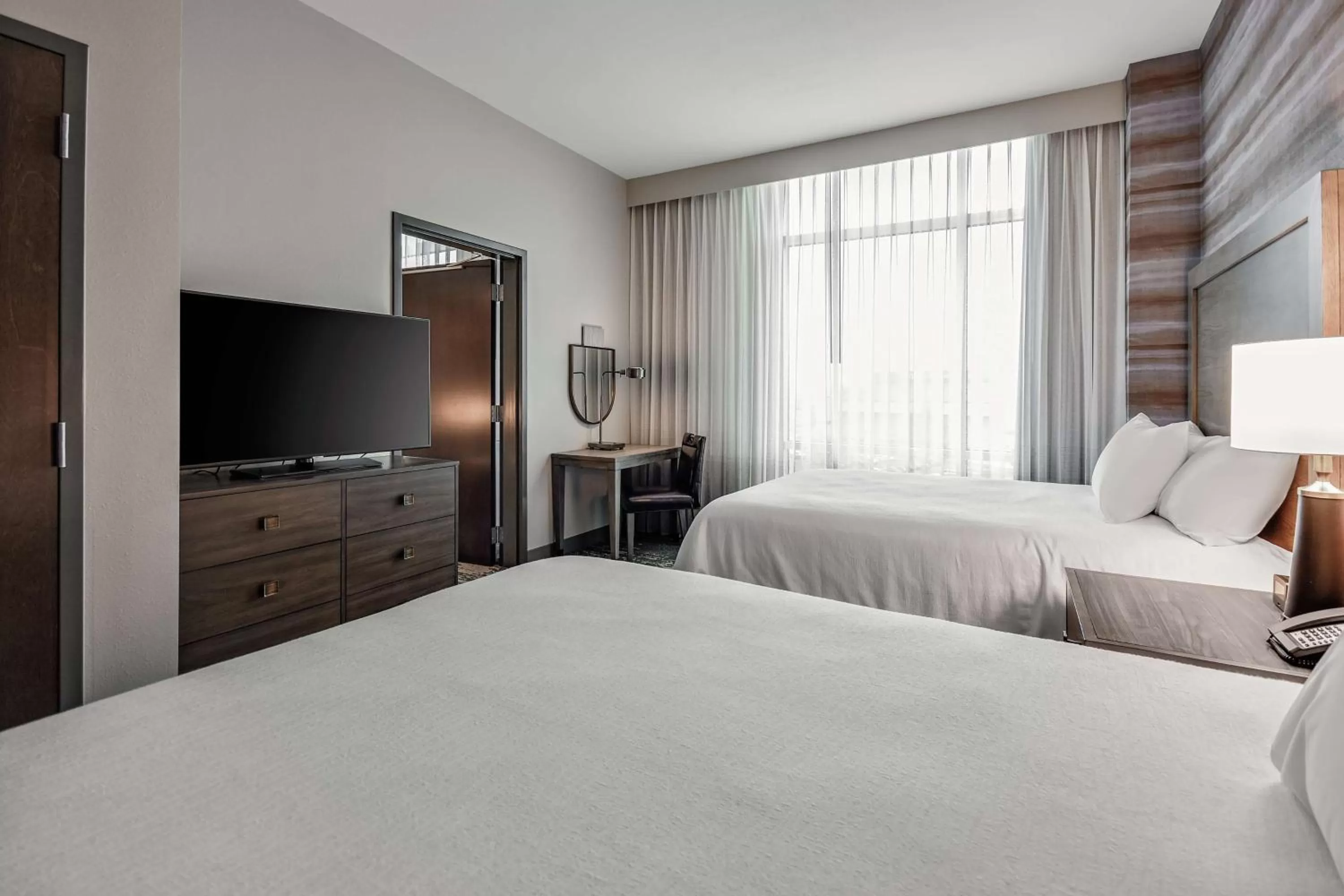 Bedroom, Bed in Embassy Suites by Hilton Jonesboro Red Wolf Convention Center