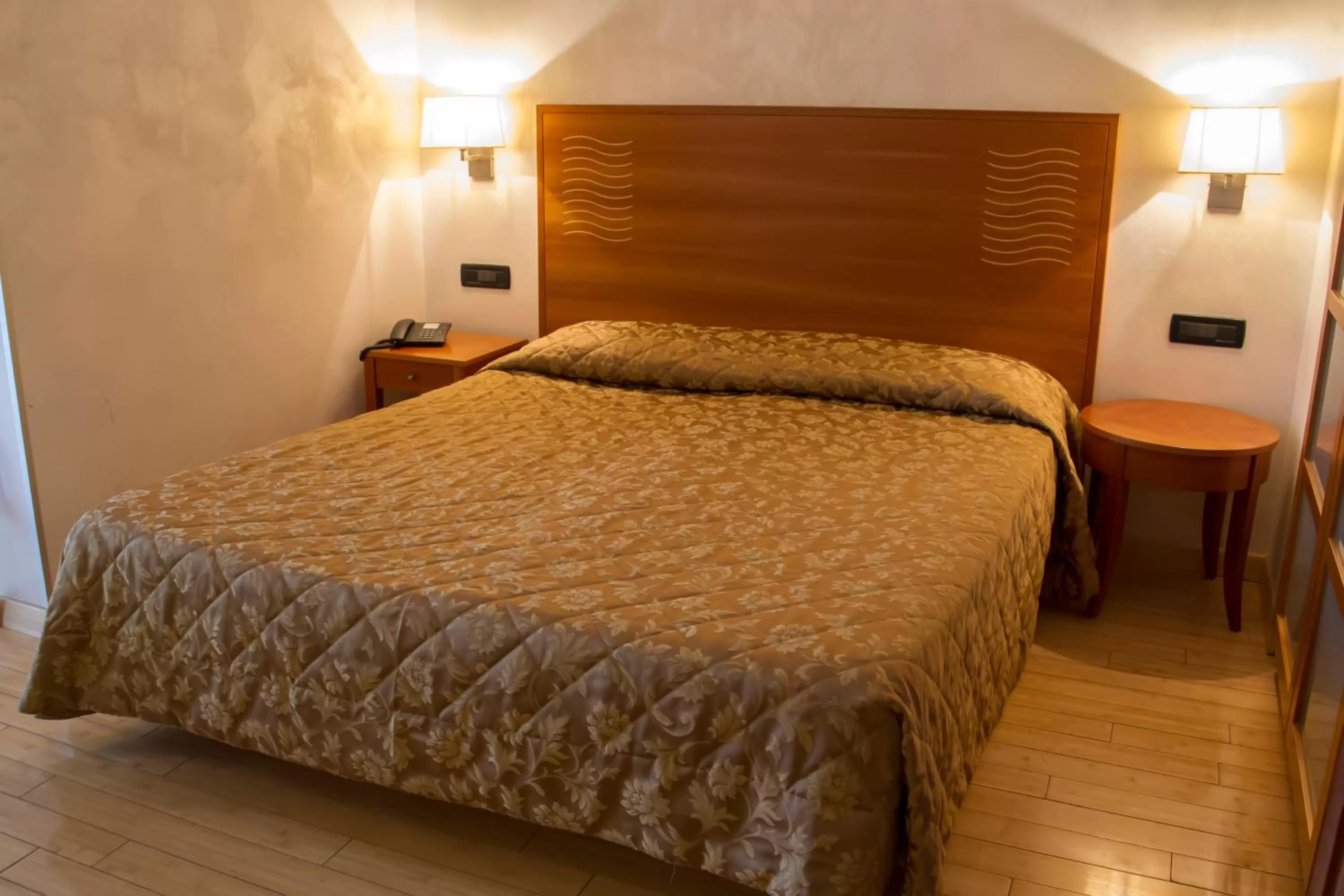 Bed in Hotel Continental