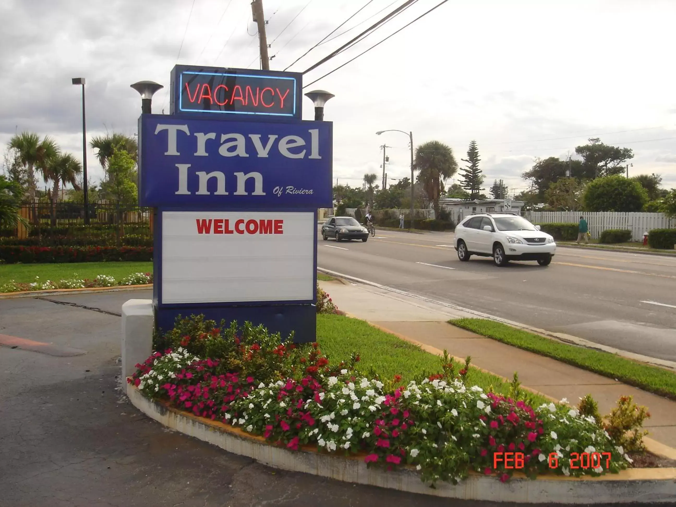 Property logo or sign in Travel Inn of Riviera Beach