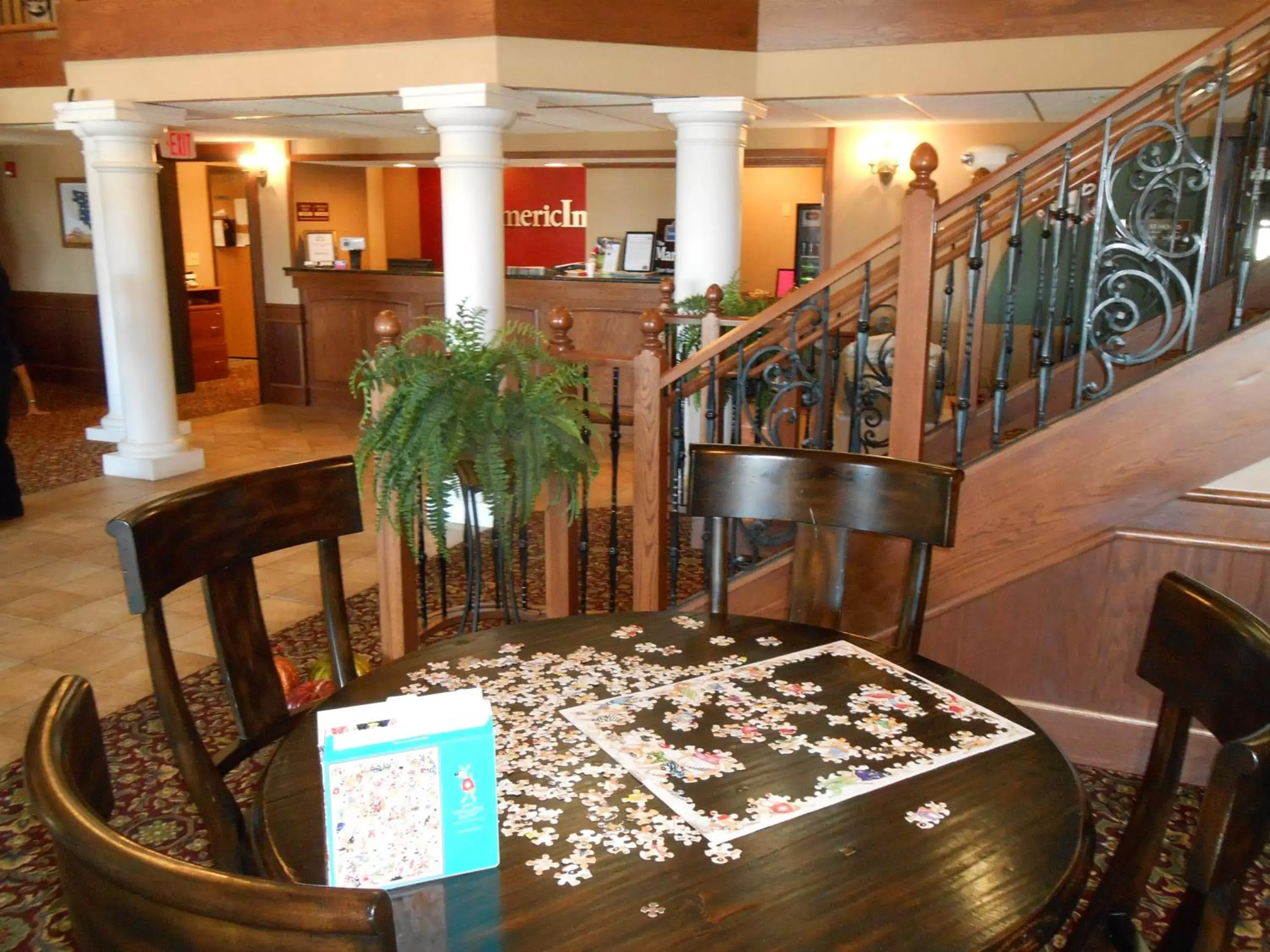 Lobby or reception, Restaurant/Places to Eat in AmericInn by Wyndham McAlester