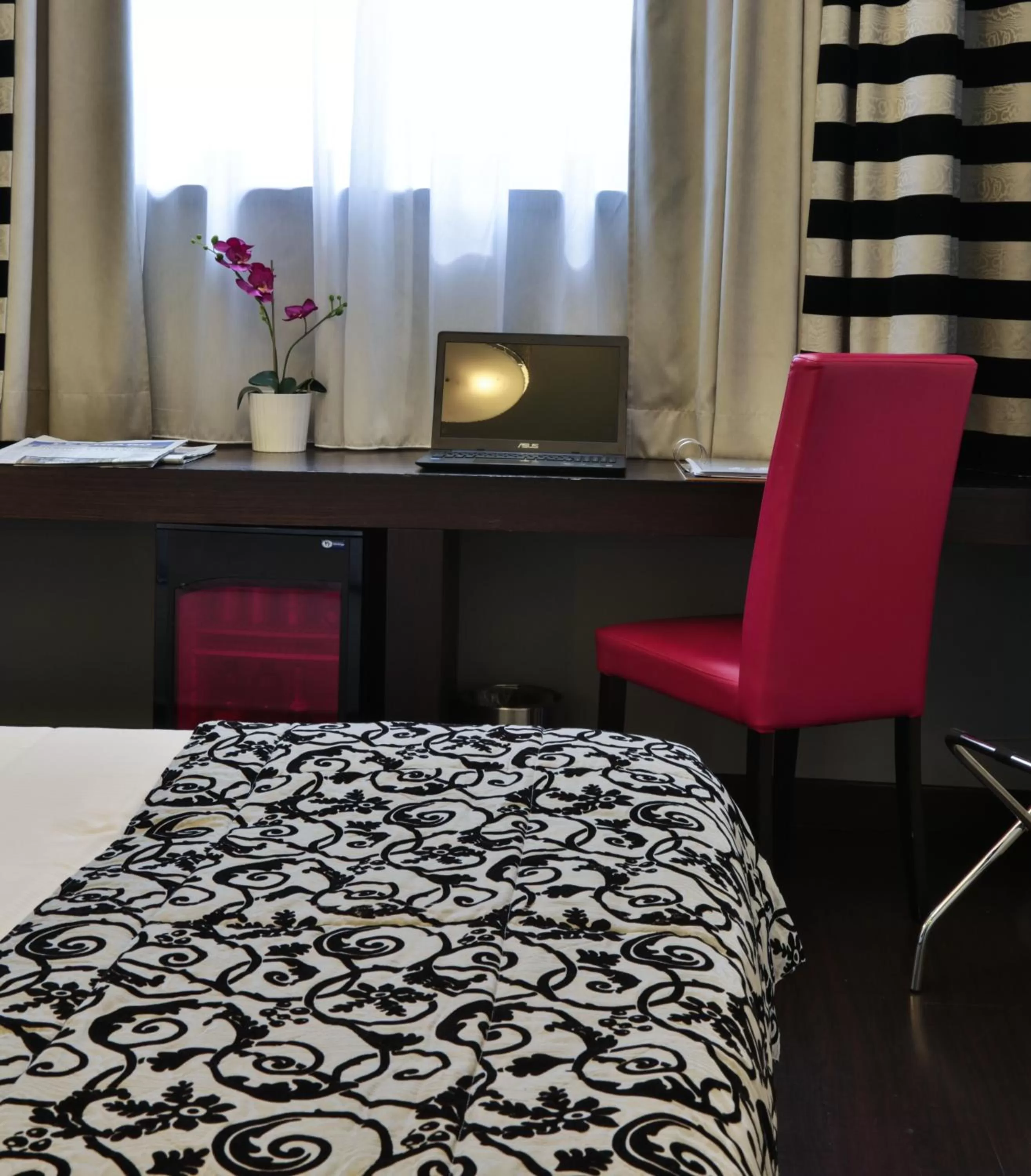 Seating area, Bed in Best Western Cinemusic Hotel