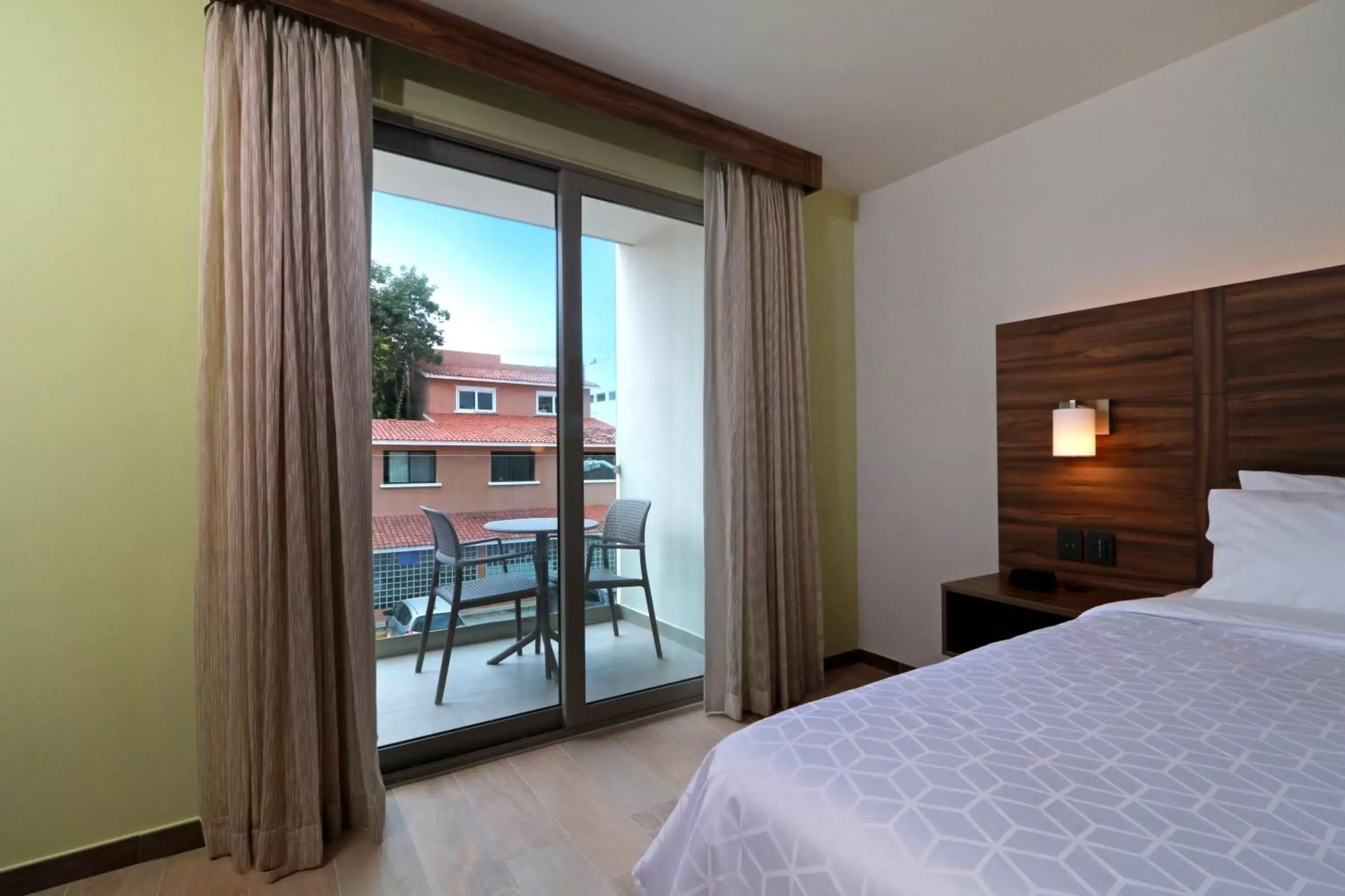 Bedroom in Holiday Inn Express & Suites - Playa del Carmen, an IHG Hotel