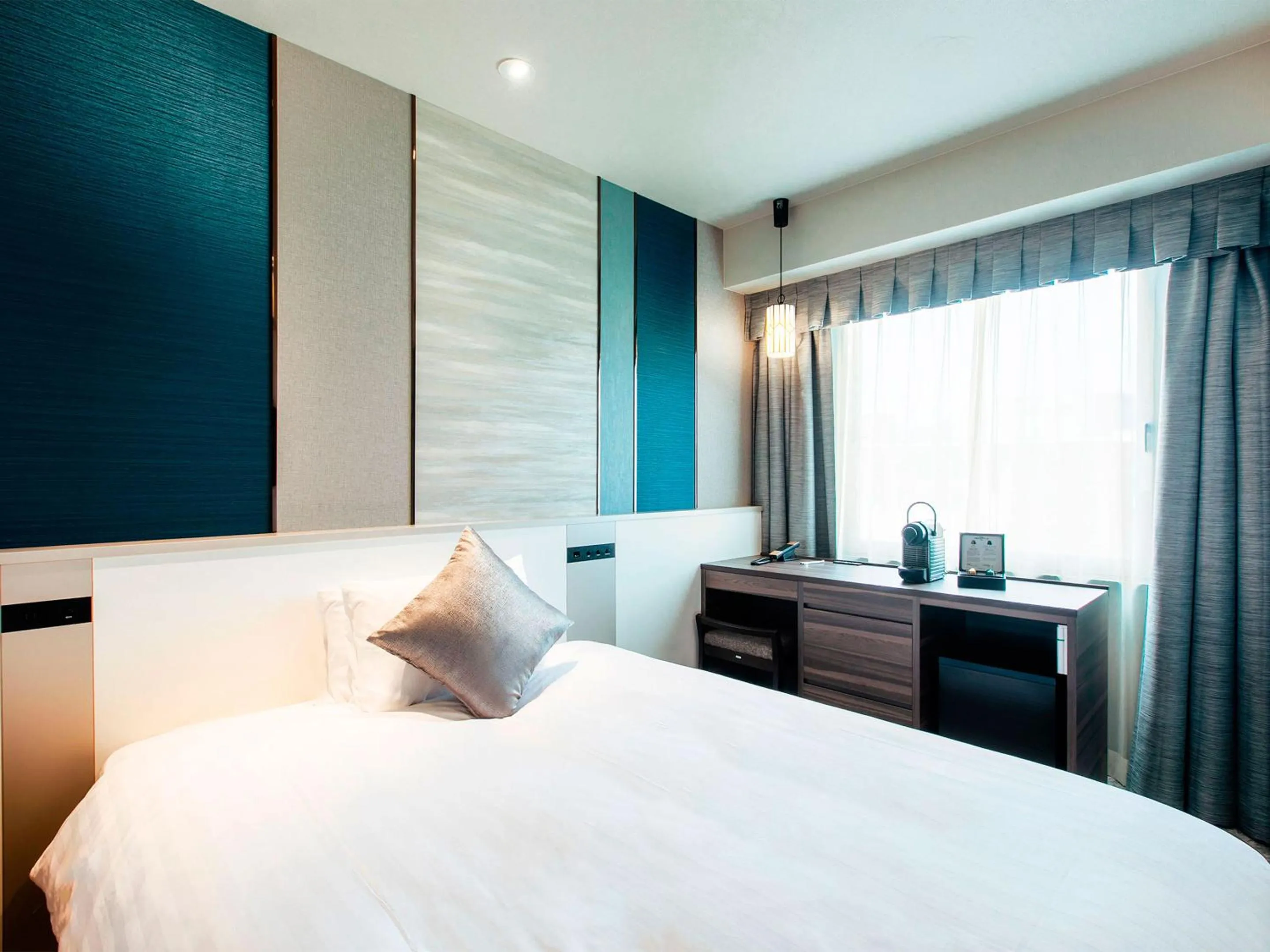 Bed in Hotel JAL City Nagasaki