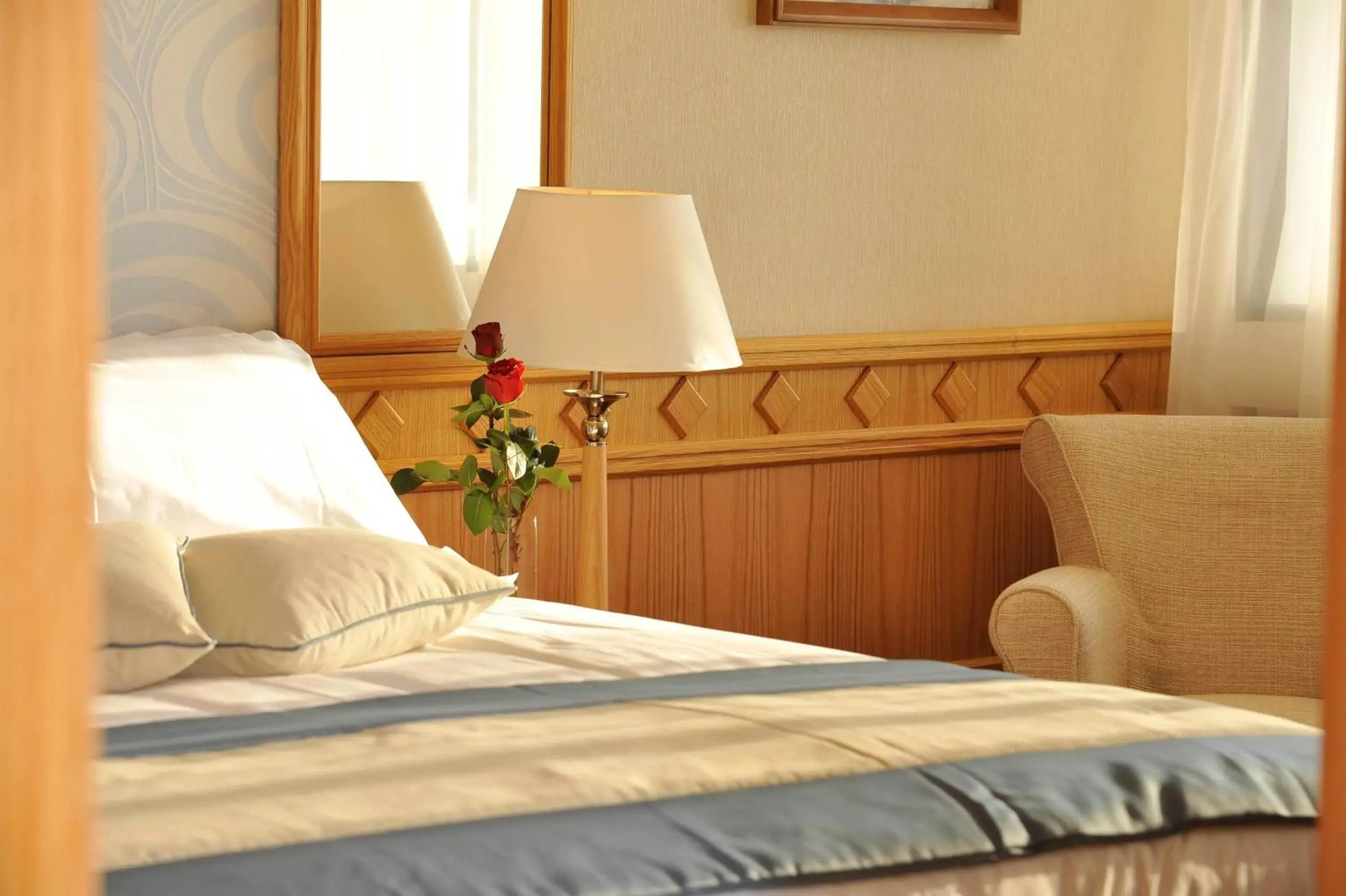 Bed in Constantinou Bros Asimina Suites Hotel