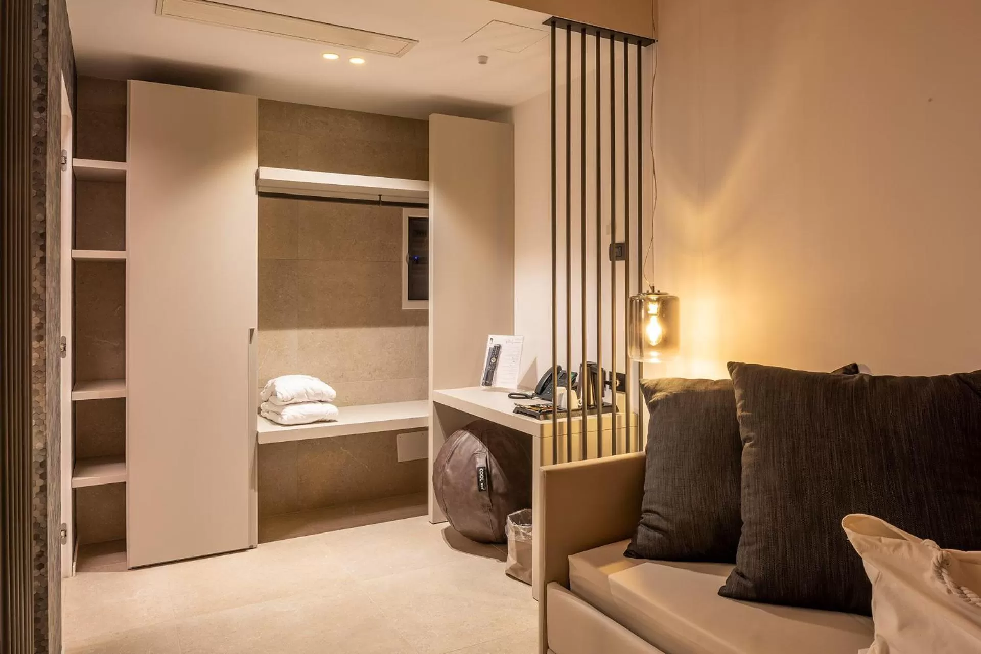 Living room, Bed in Relais Limonaia - Suites & Garden SPA