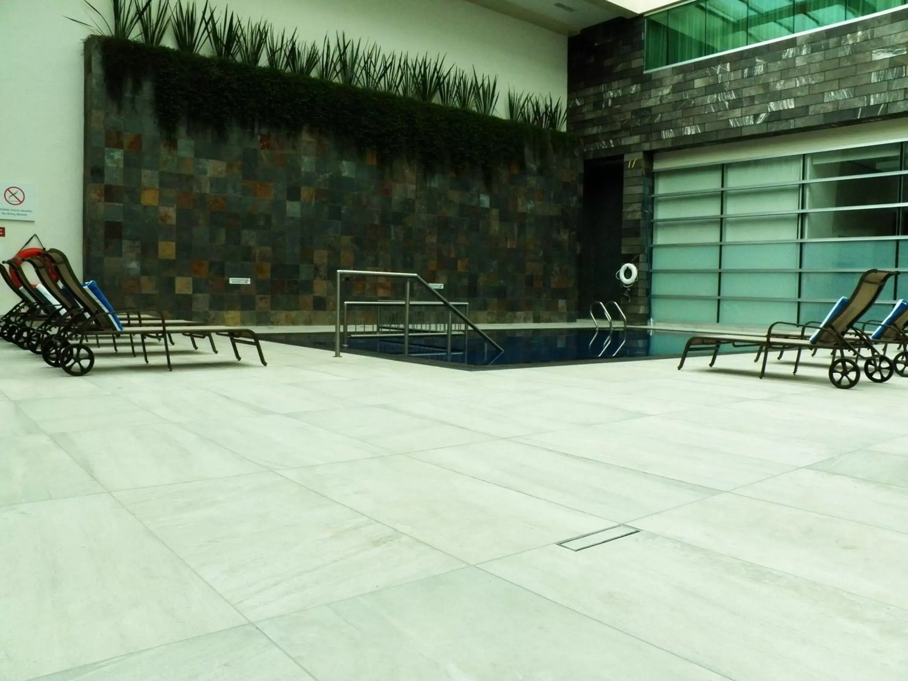 Swimming pool in Holiday Inn & Suites Plaza Mayor, an IHG Hotel