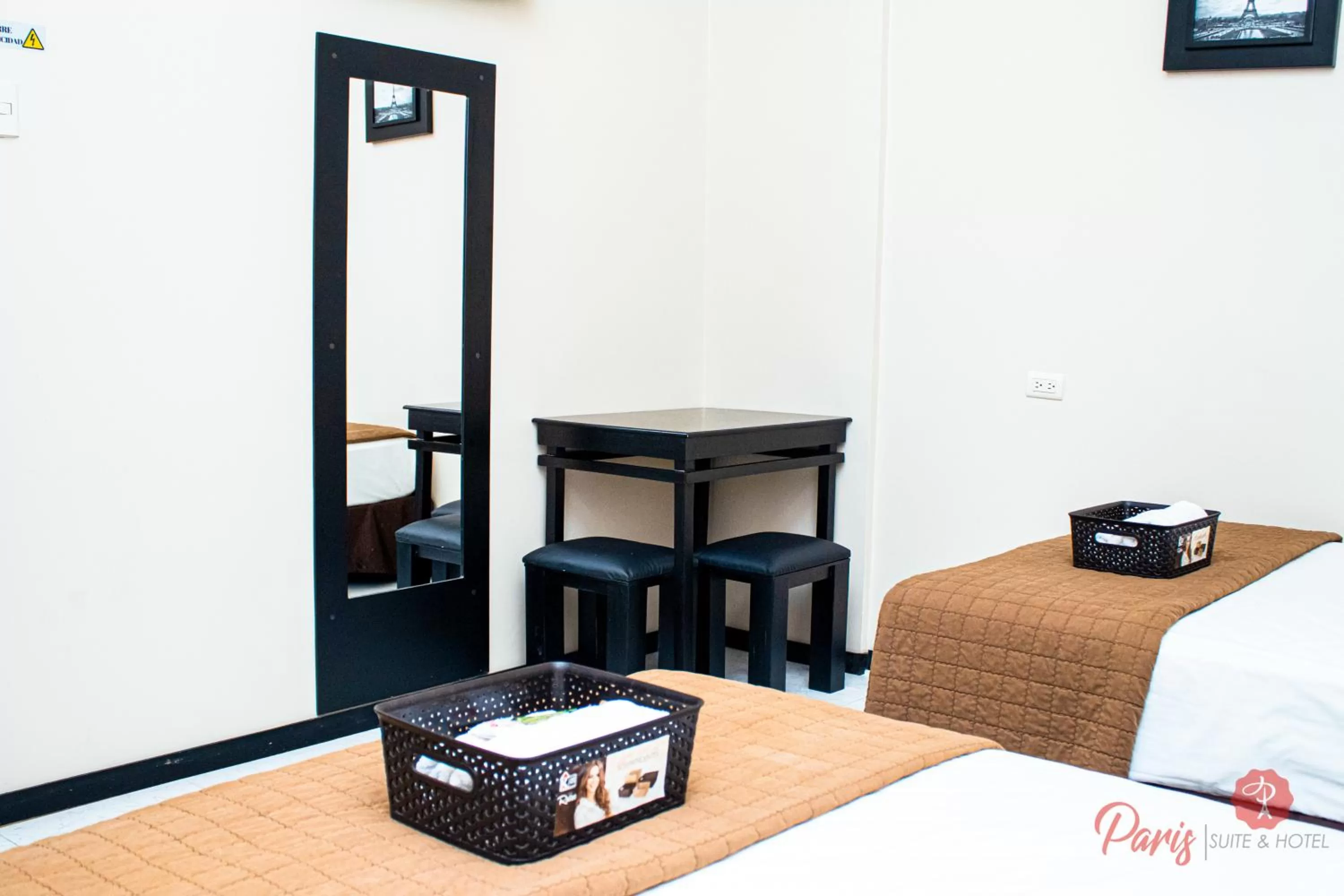 Bed, Dining Area in Paris Suite Hotel