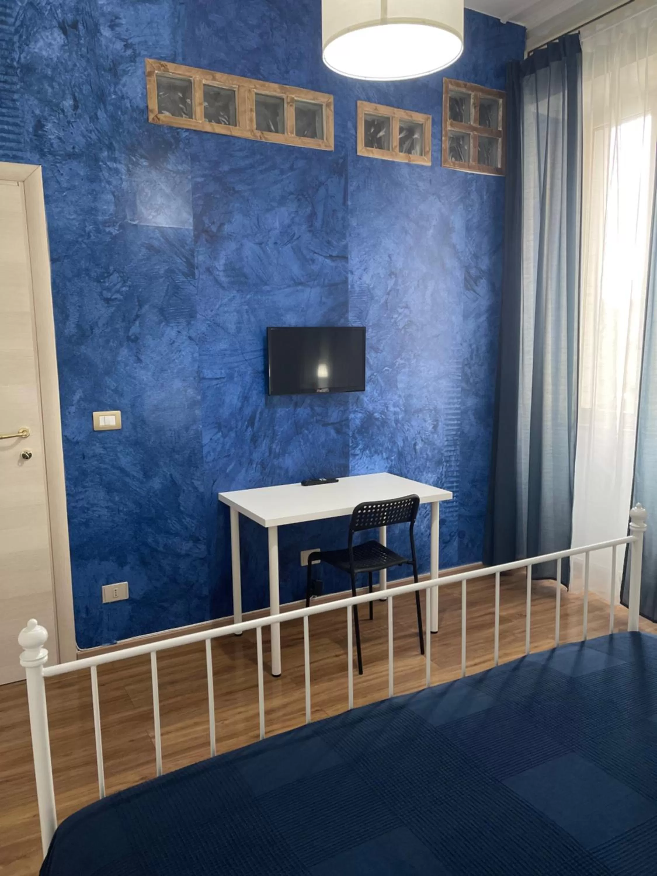 TV and multimedia, TV/Entertainment Center in B&B Acqua Azzurra