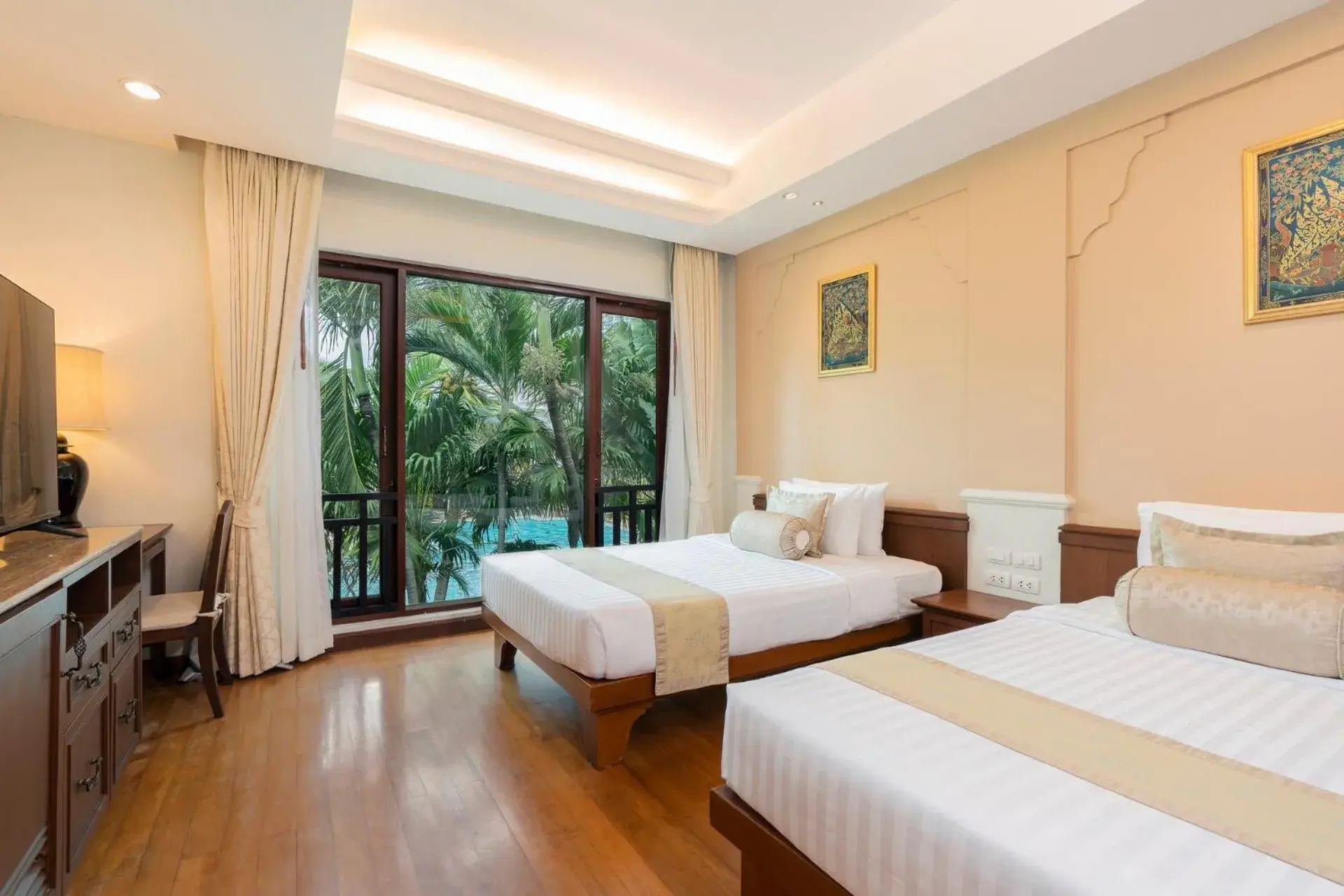 Bed in Ravindra Beach Resort & Spa - SHA Extra Plus