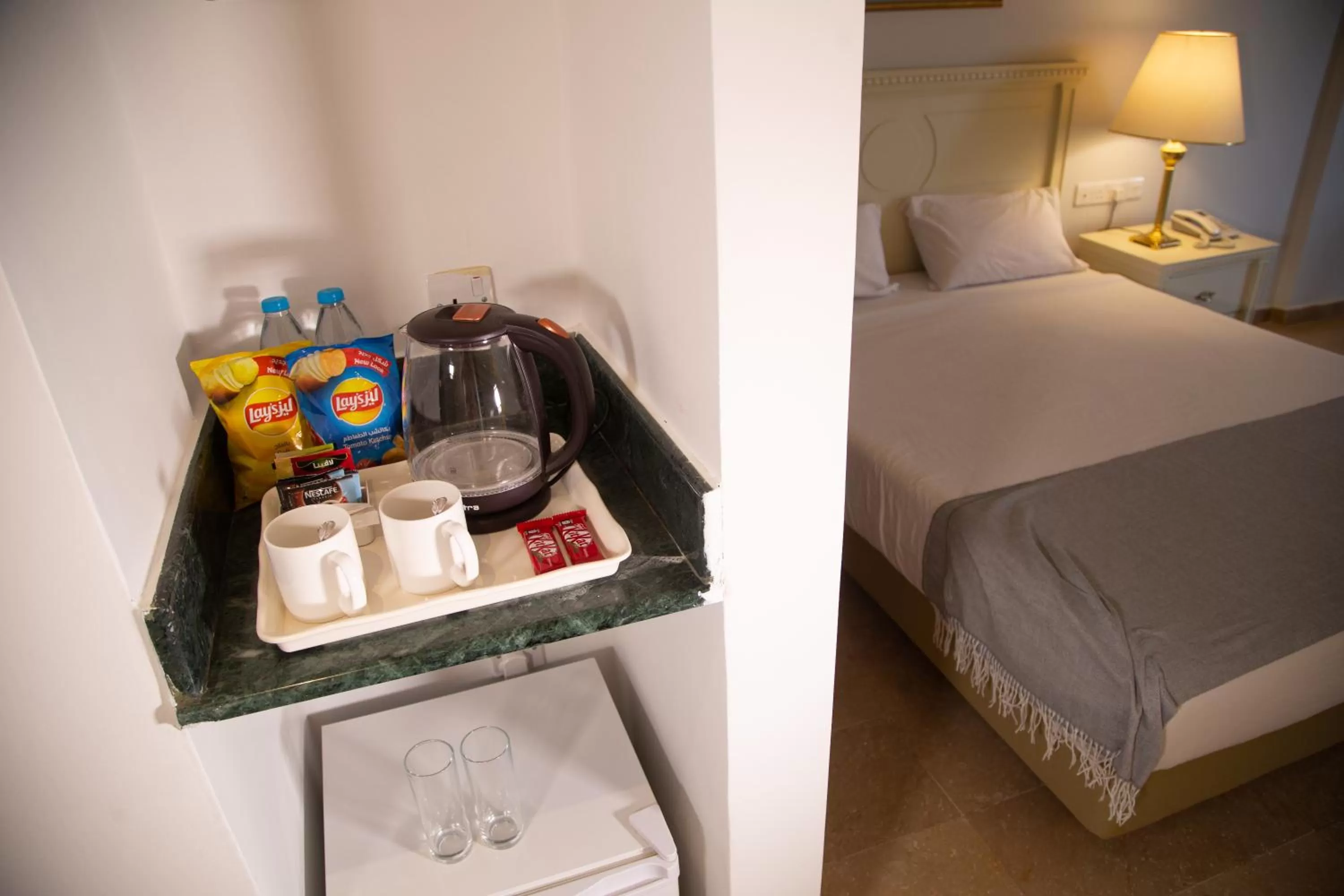 Coffee/tea facilities, Bed in Grand Hotel Madaba