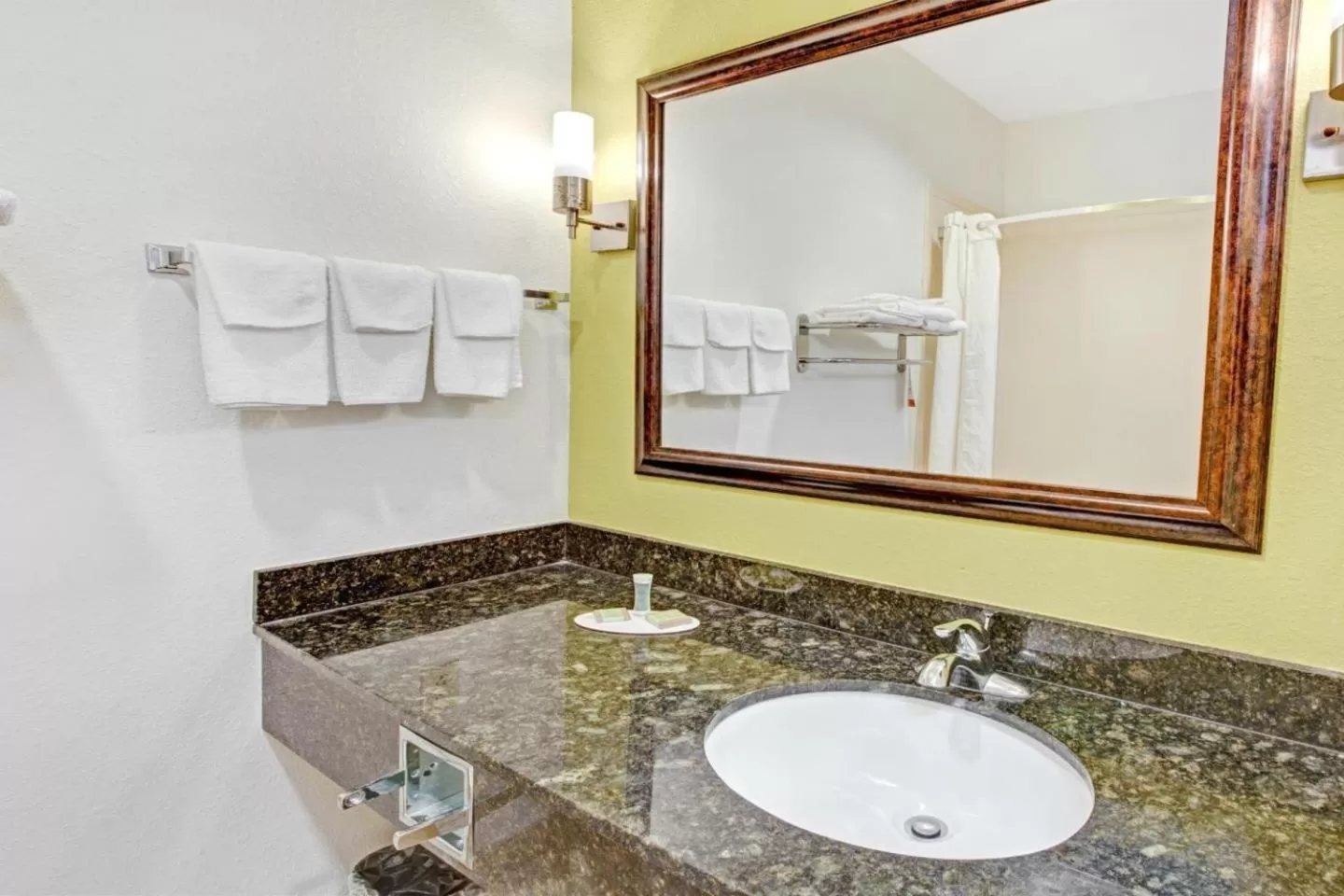Bathroom in Scottish Inns and Suites - La Porte