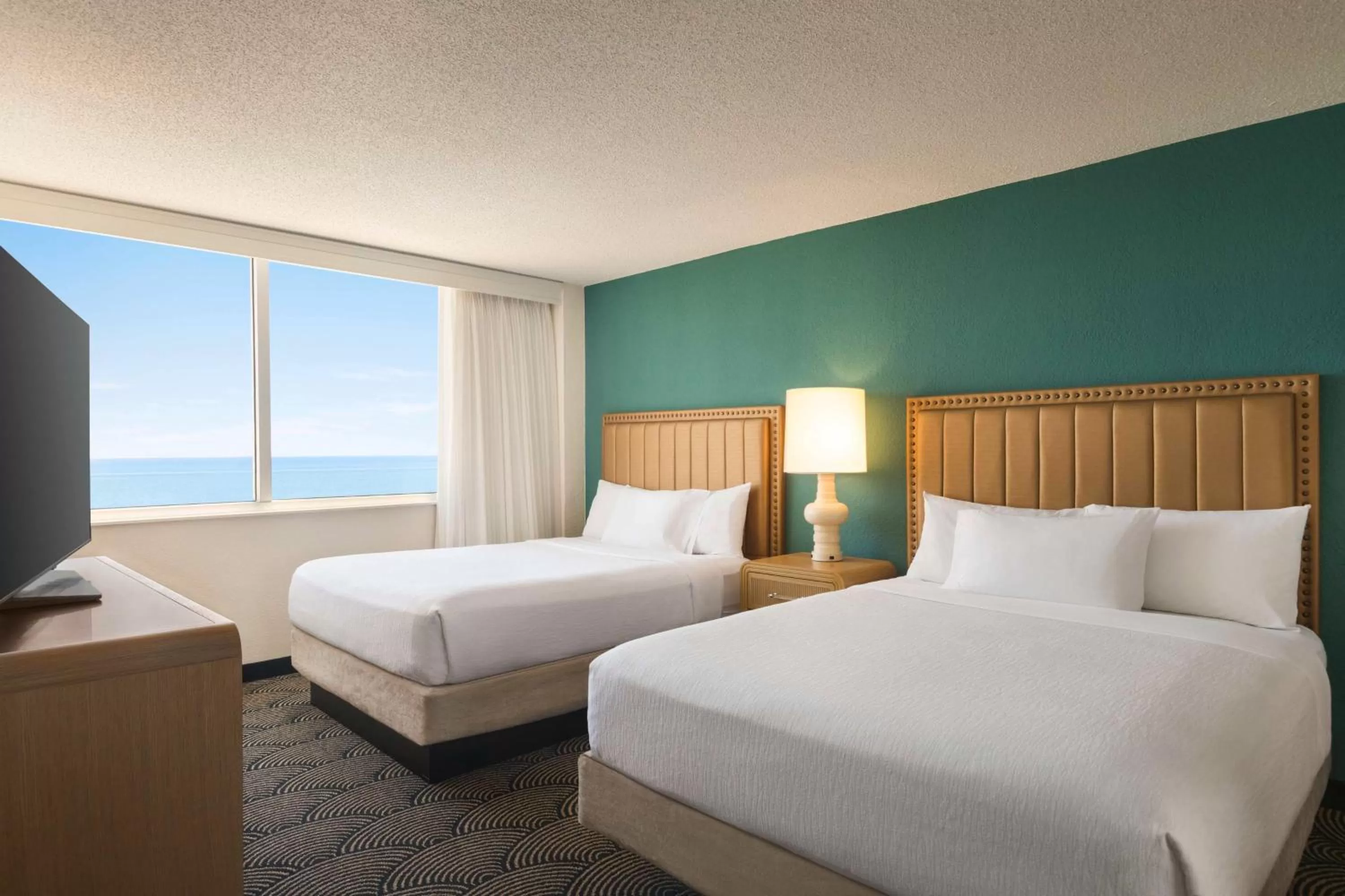 Bed in Embassy Suites by Hilton Deerfield Beach Resort & Spa