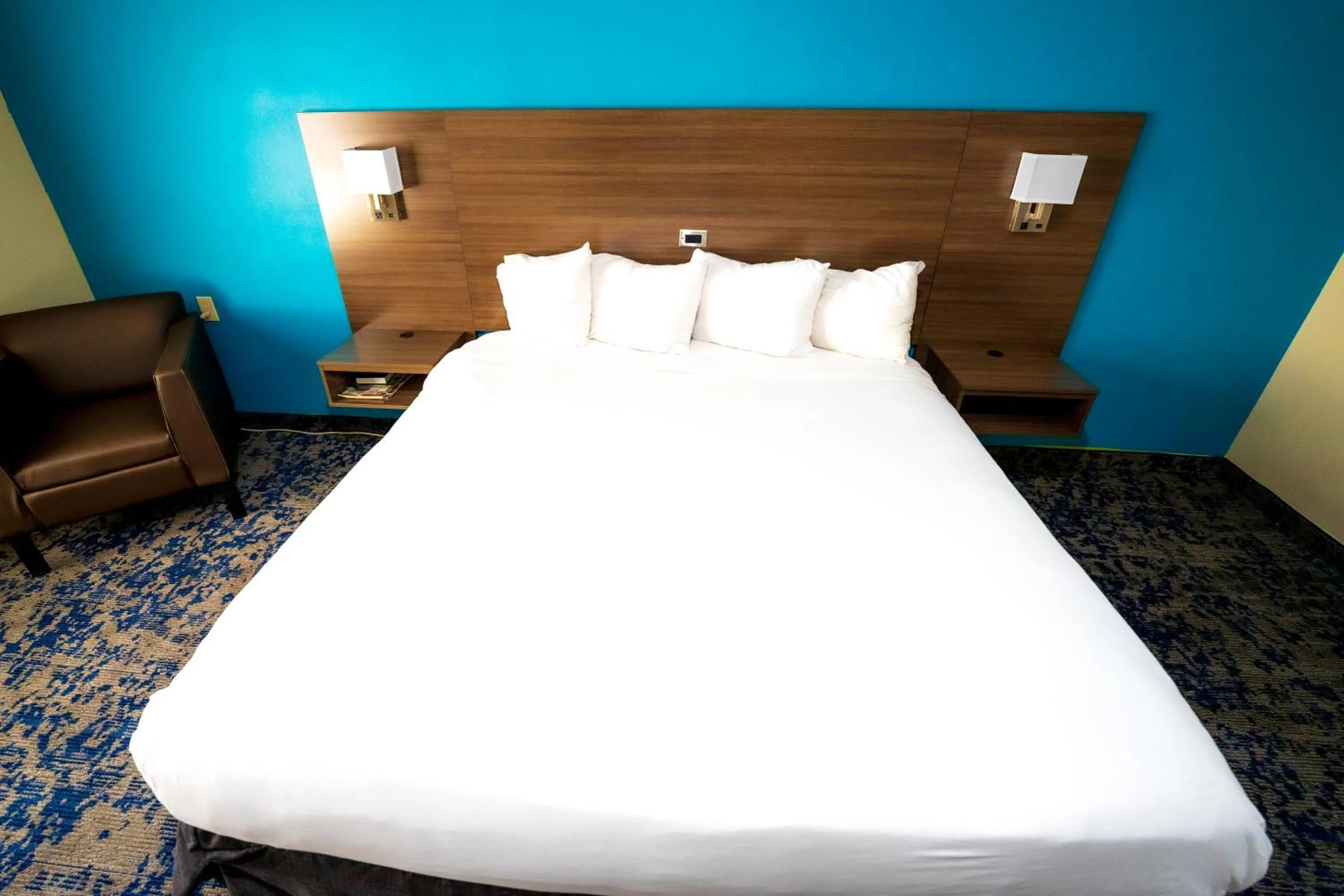 Bed in Quality Inn & Suites